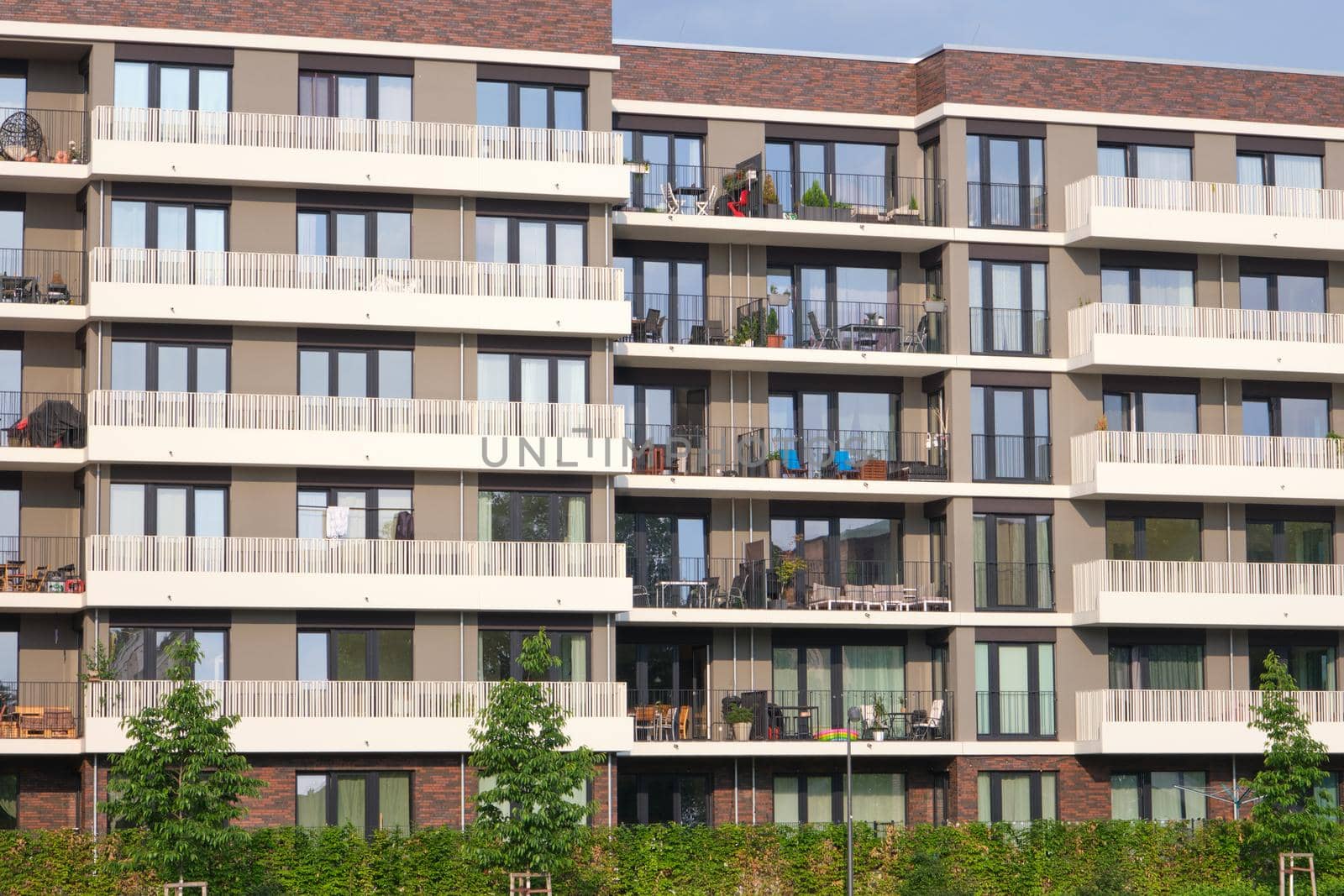 Facade of a modern apartment building by elxeneize