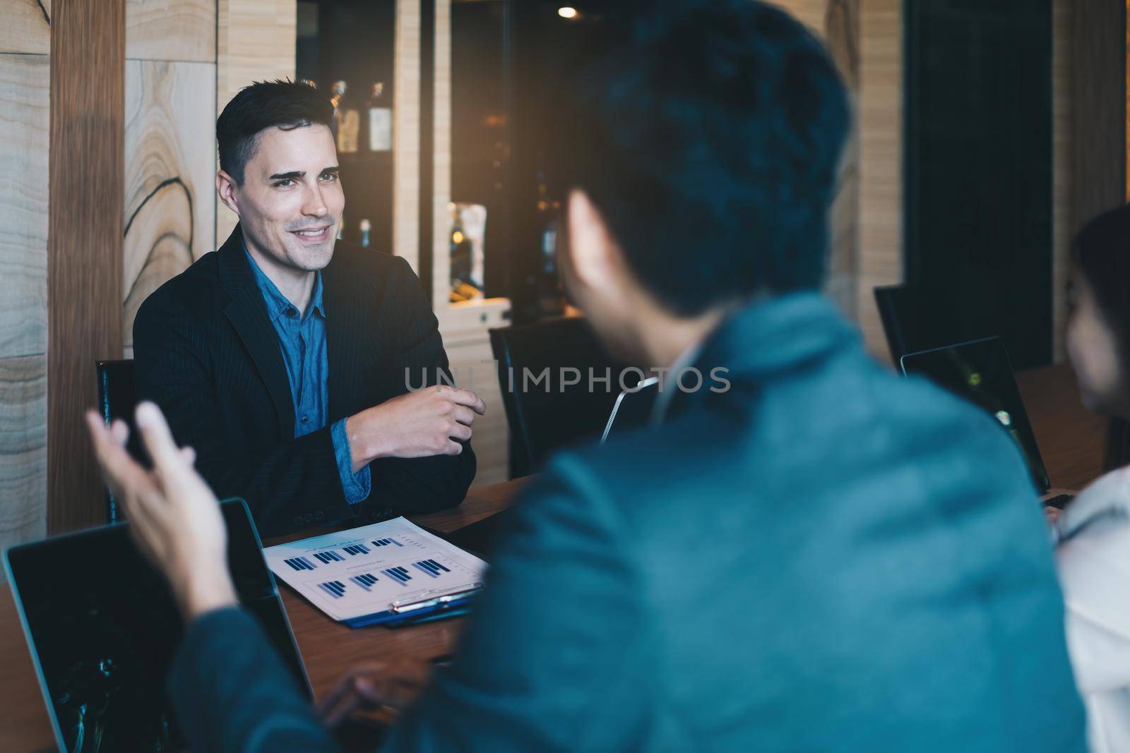 During a job interview, a man in a suit and gives a presentation about himself by itchaznong