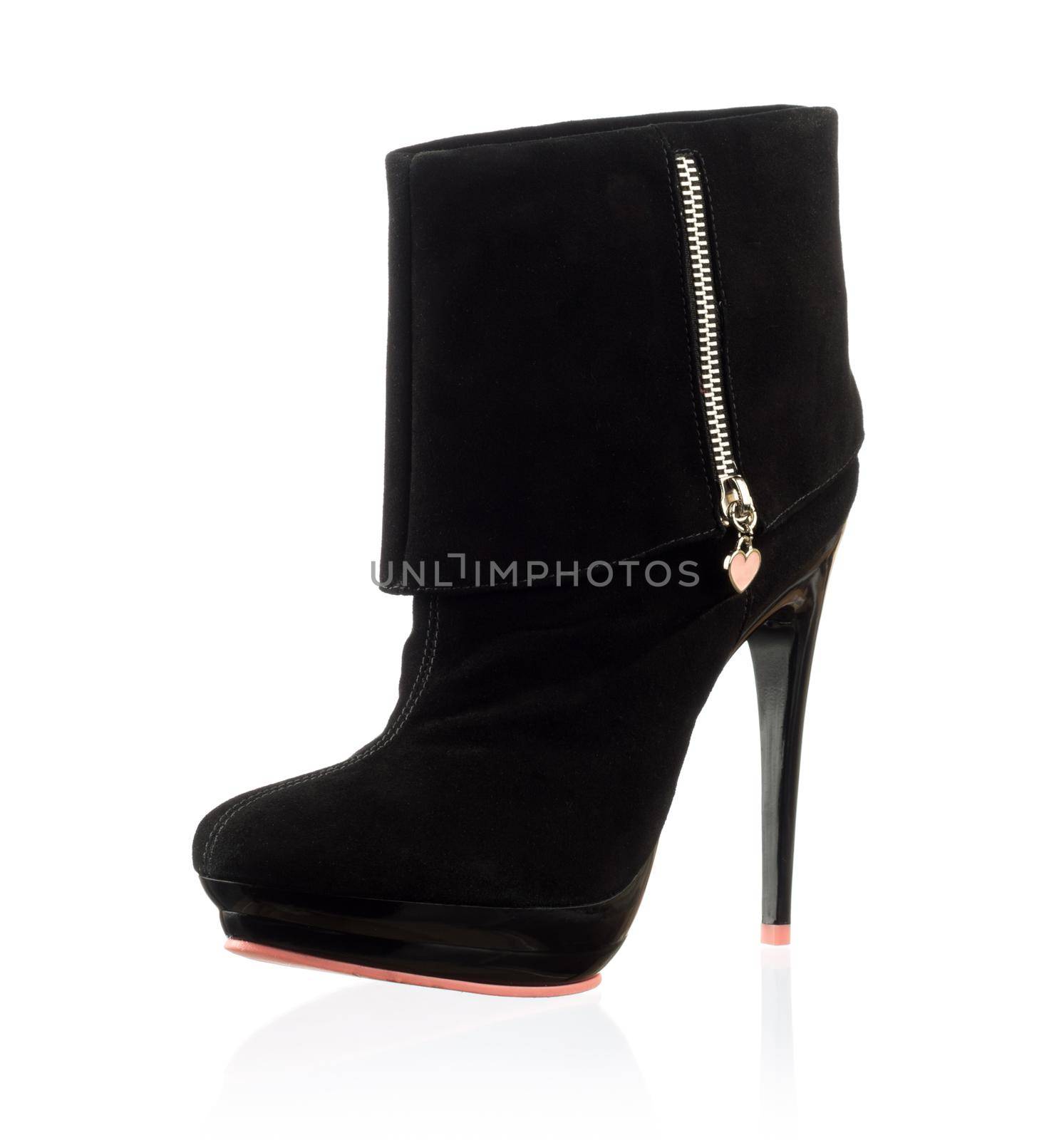 Modern fashionable women winter boot shot in studio