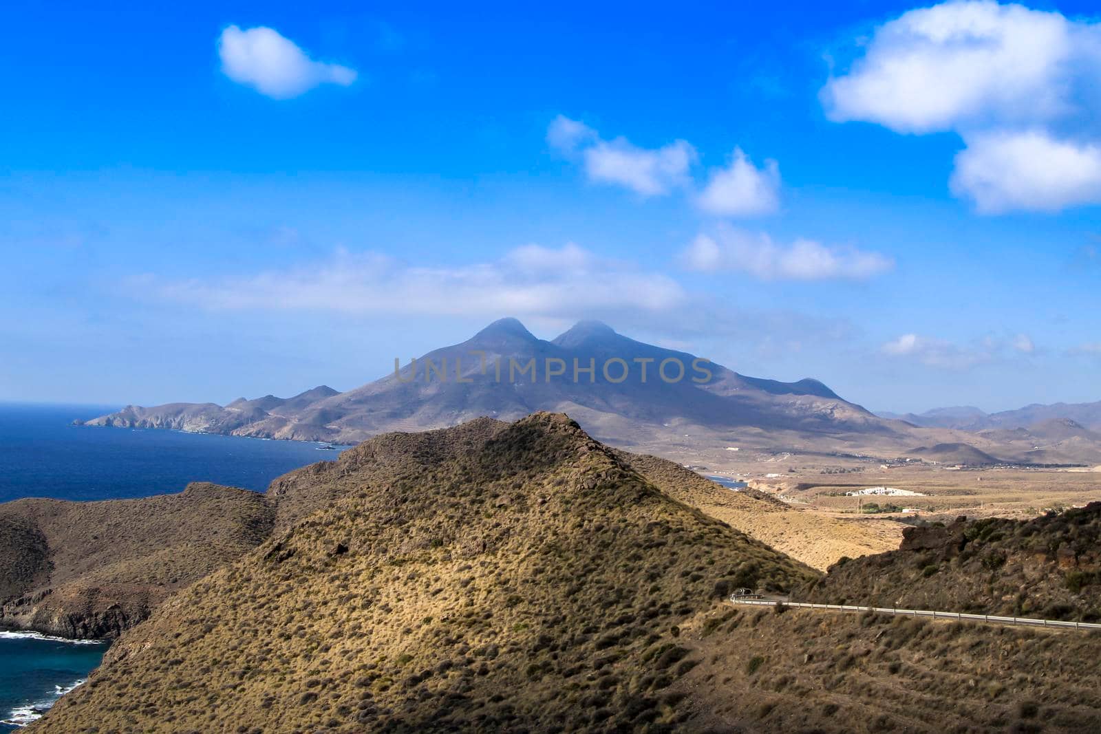 Beautiful seascape in Isleta del Moro village. Volcanous in the background.