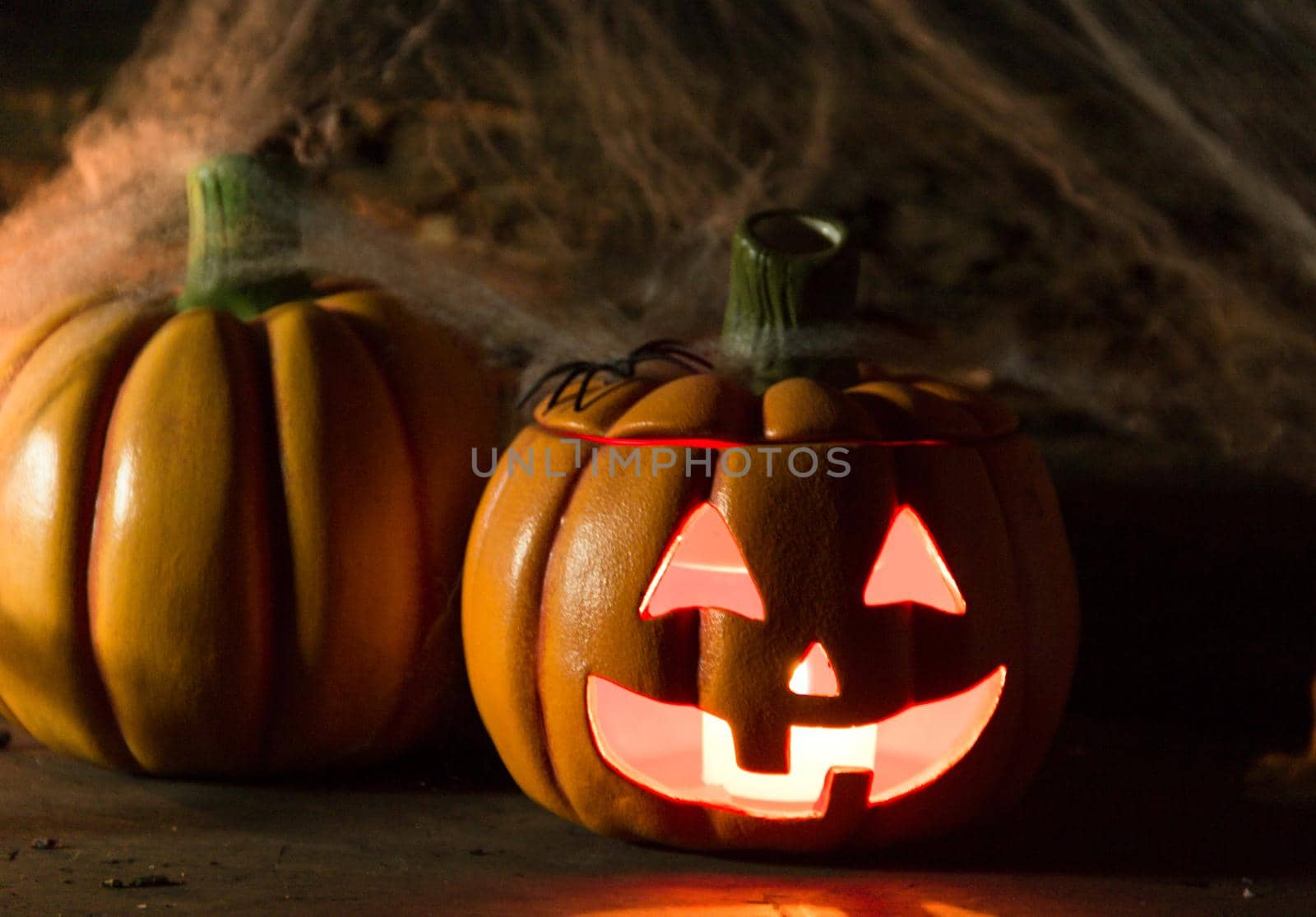 decoration for the celebration of hallowen with pumpkins, spiders, candles by GabrielaBertolini