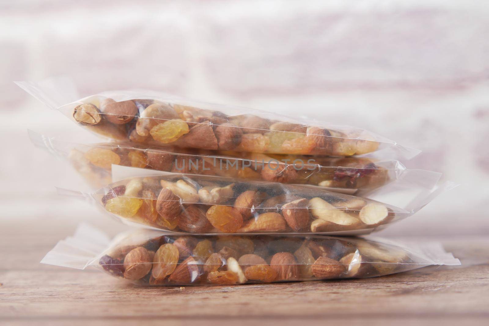 packet of mixed nuts on table by towfiq007