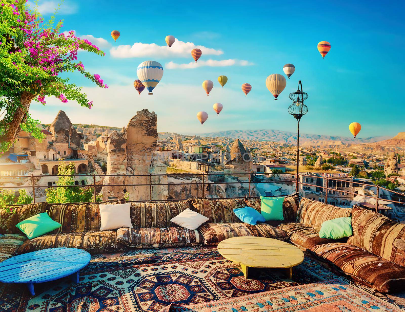 Hot air balloons at sunset in Goreme village, Cappadocia, Turkey