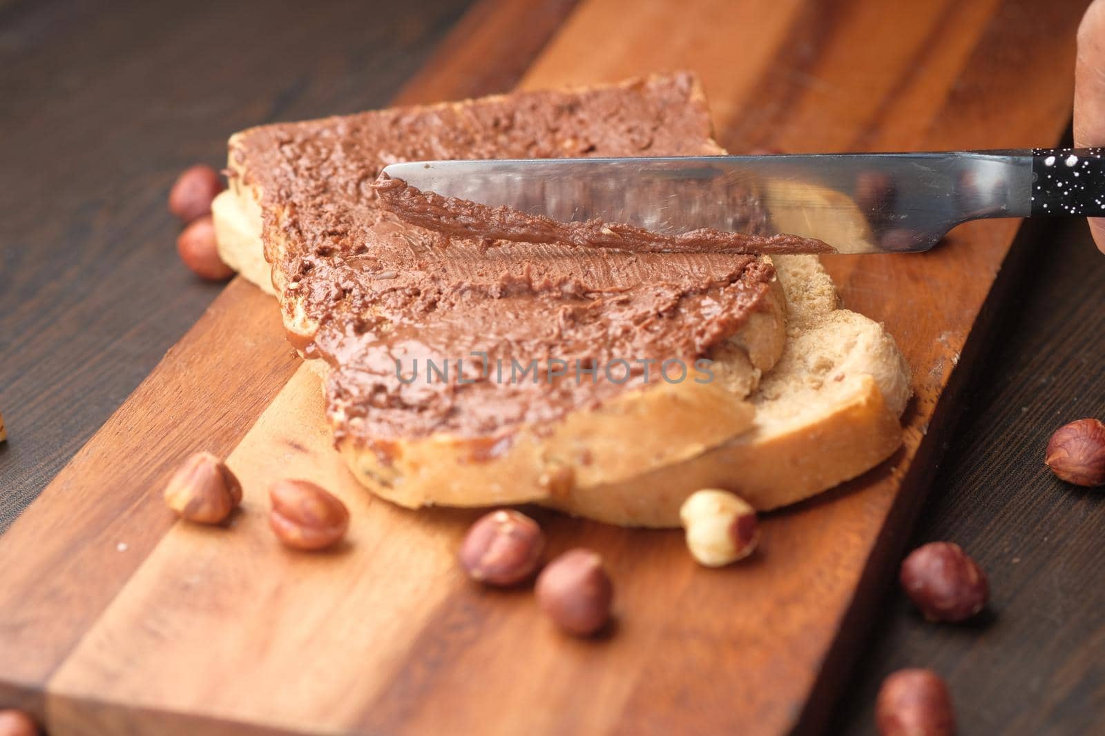 Chocolate Hazelnut Spread on a Bread on Table