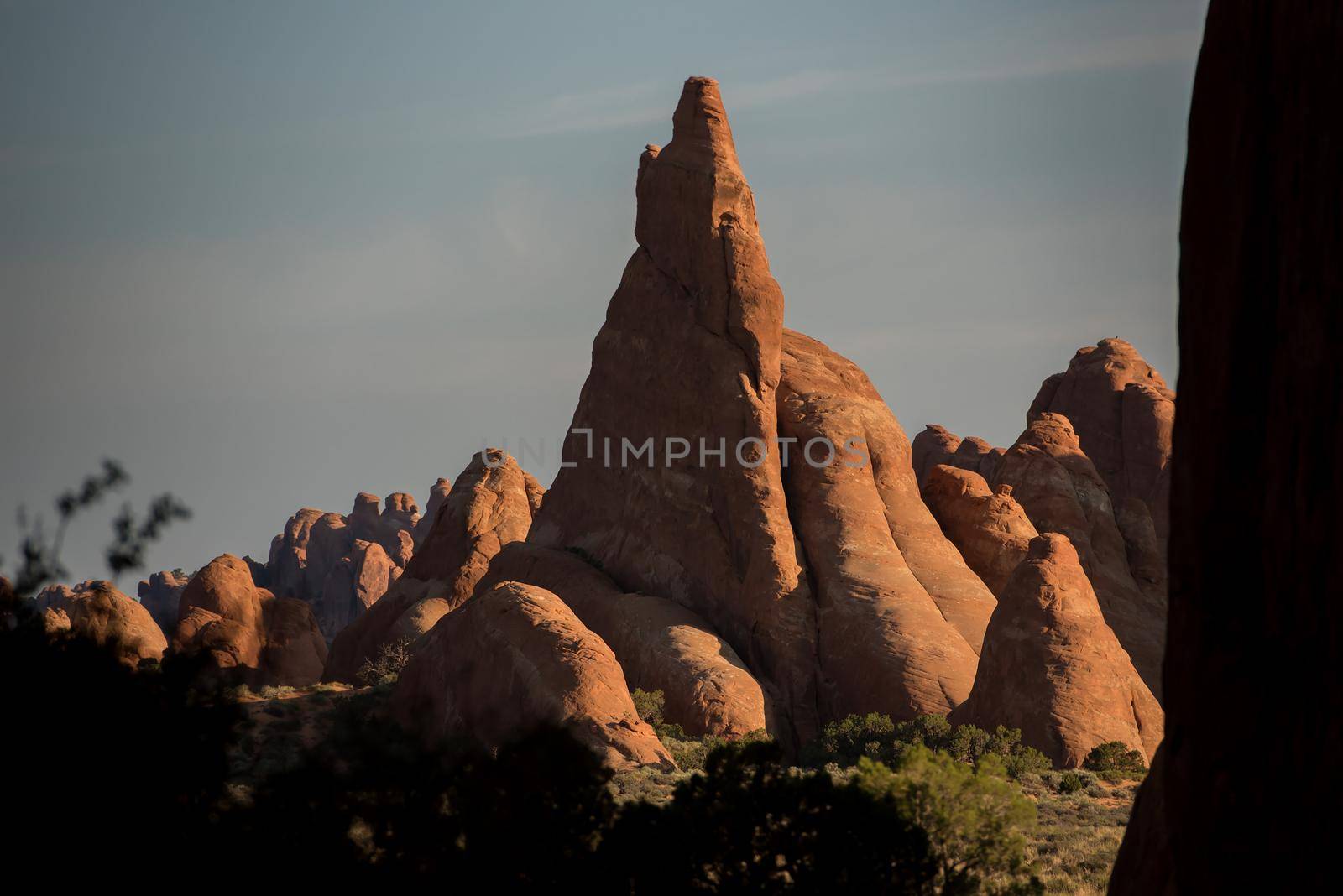 Utah Arches National Park triangular formations at sunset by jyurinko