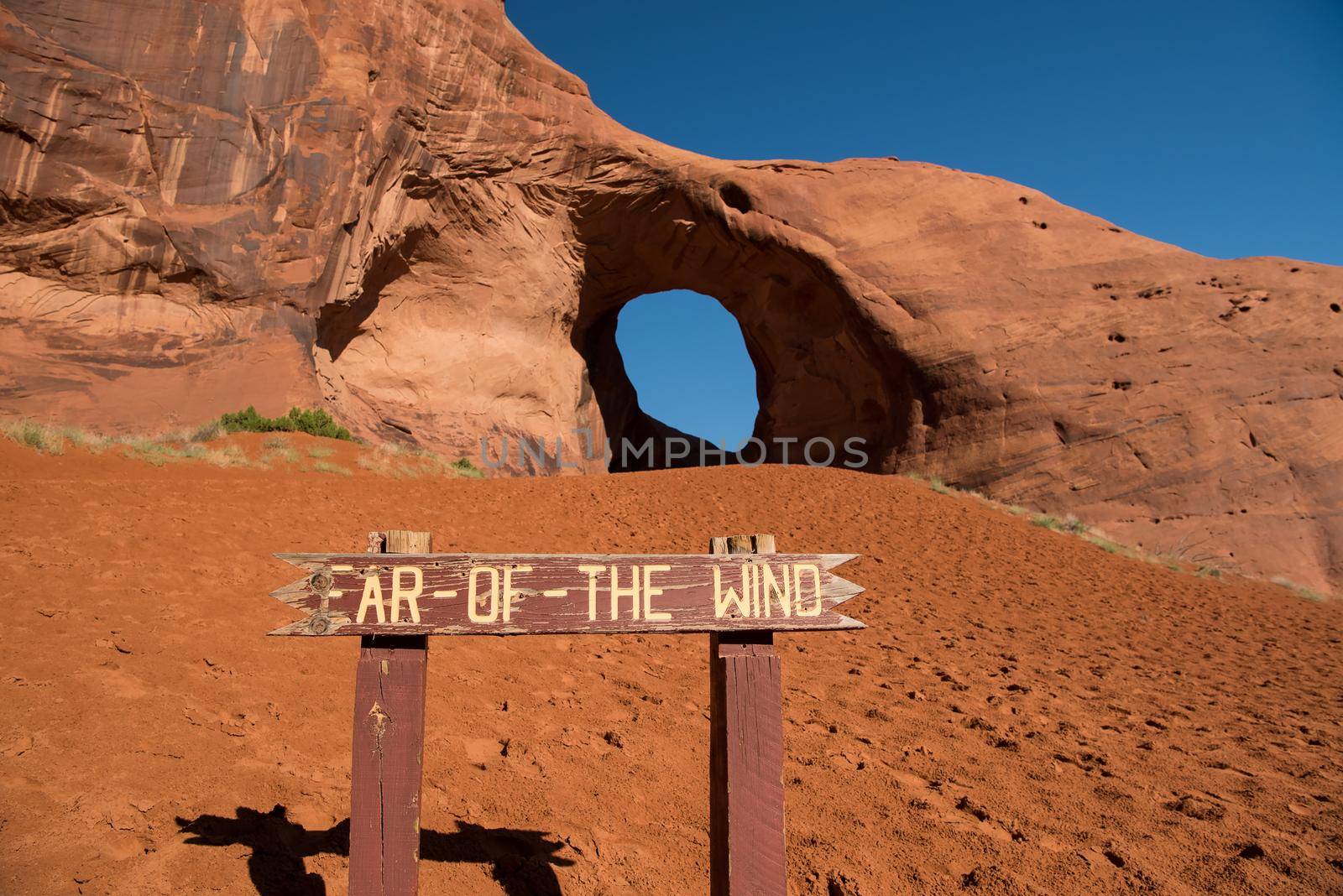 Giant sized hole in rock face at Ear-of-the-Wind arch
