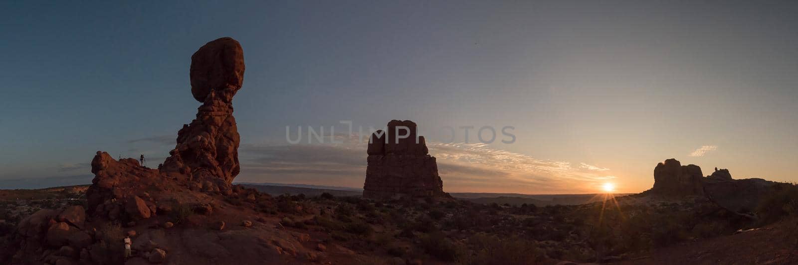Utah Panorama of balanced rock and mesa rock at sunset by jyurinko