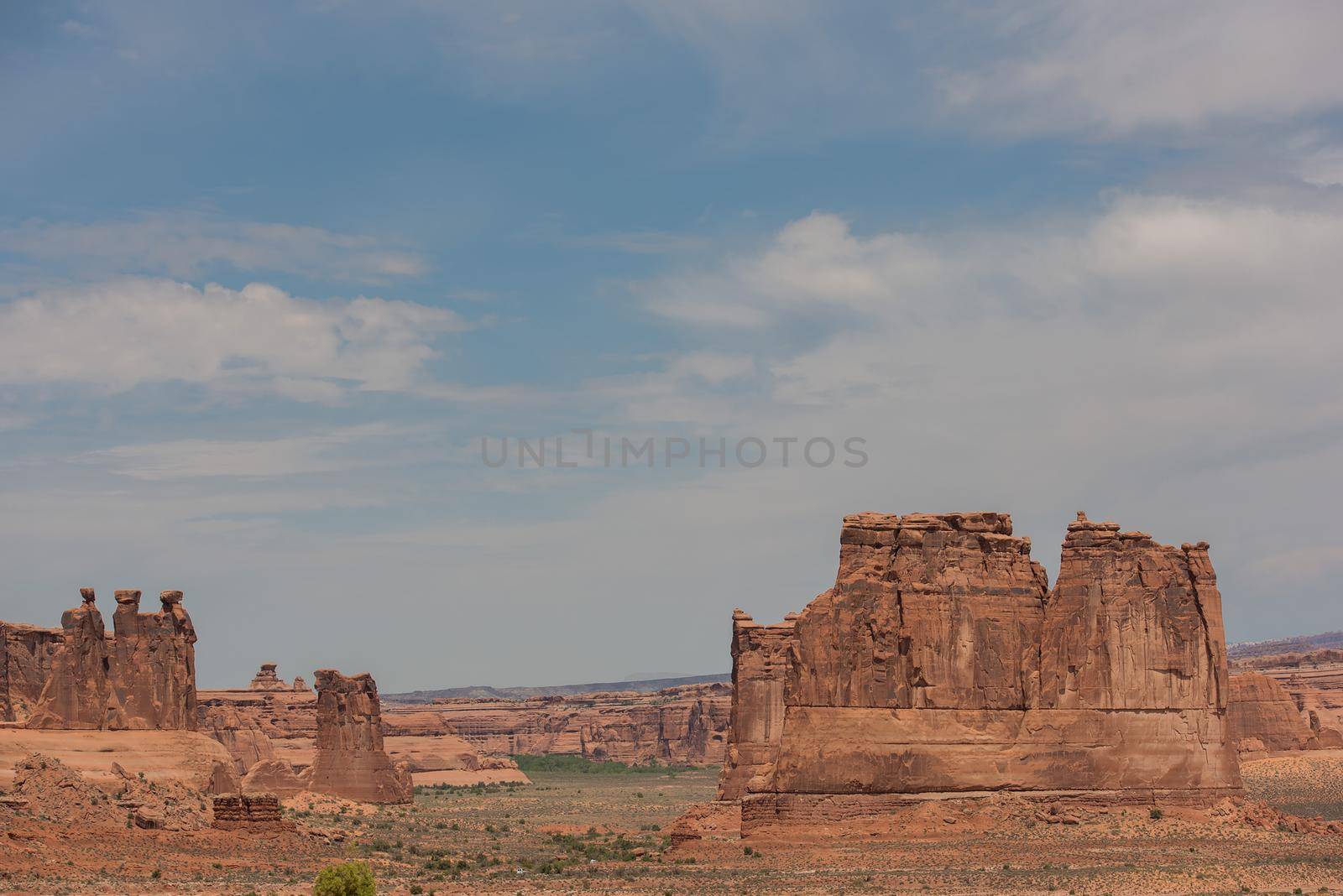 Utah textures of mesas with mountains in background by jyurinko