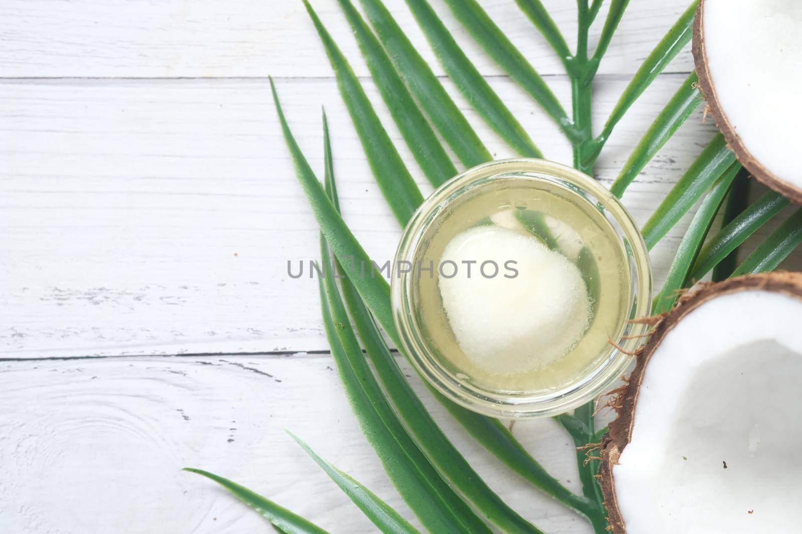 slice of fresh coconut on a table cloth .