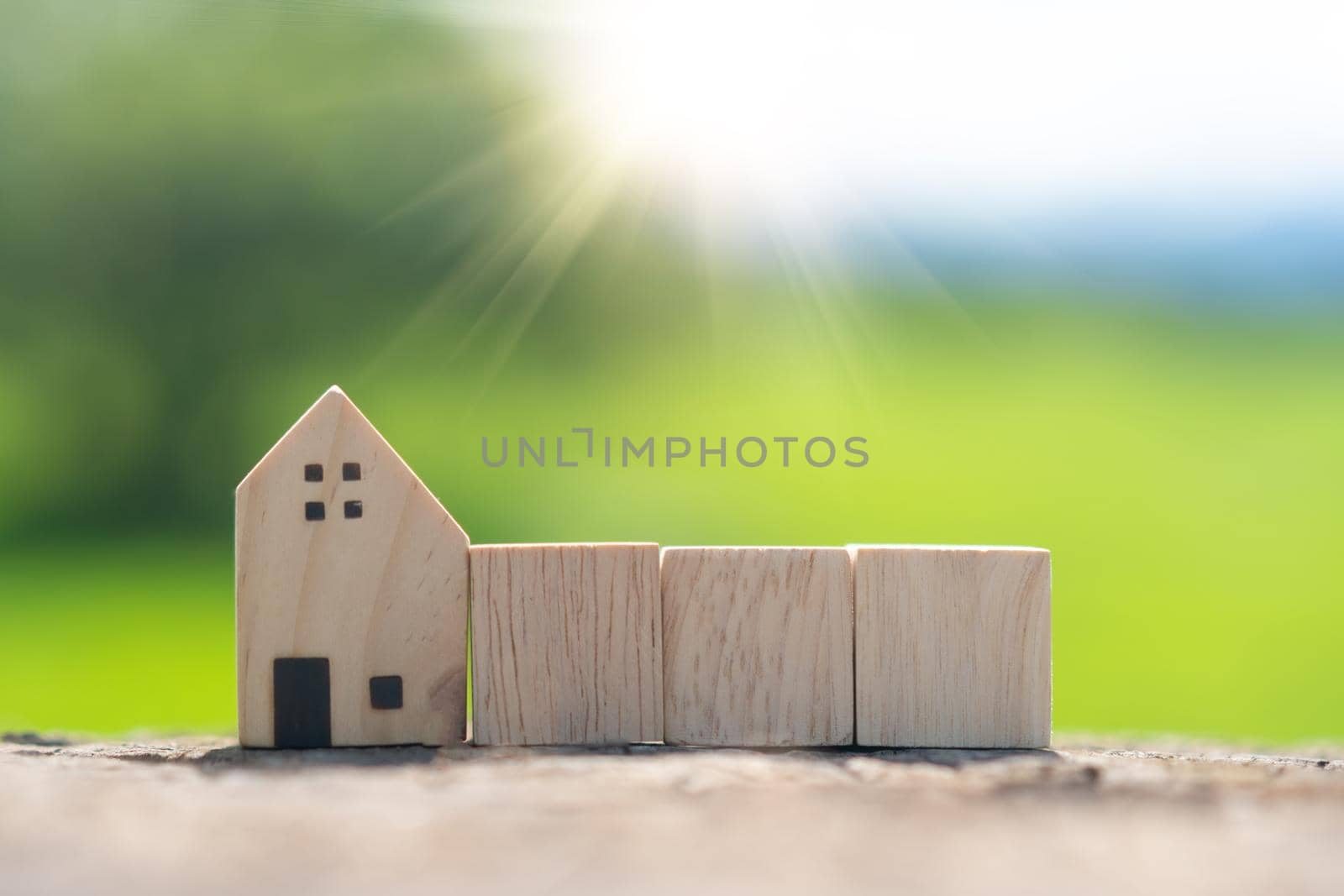 In a hand-held background, a blank wooden cube can be used to add text or an icon.