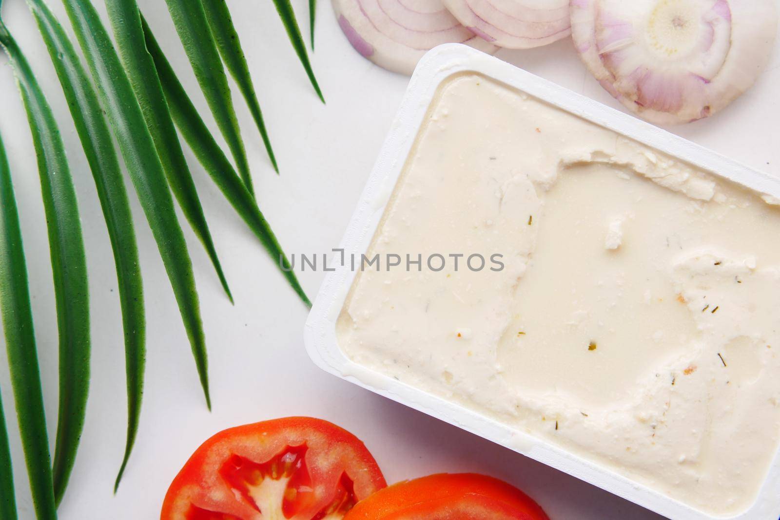 low fact cheese cream in a container on table