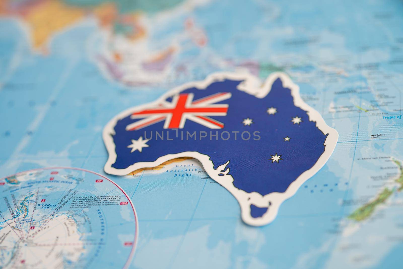 Bangkok, Thailand - September 20, 2021 Australia flag on world map background. flag on world map background. by pamai