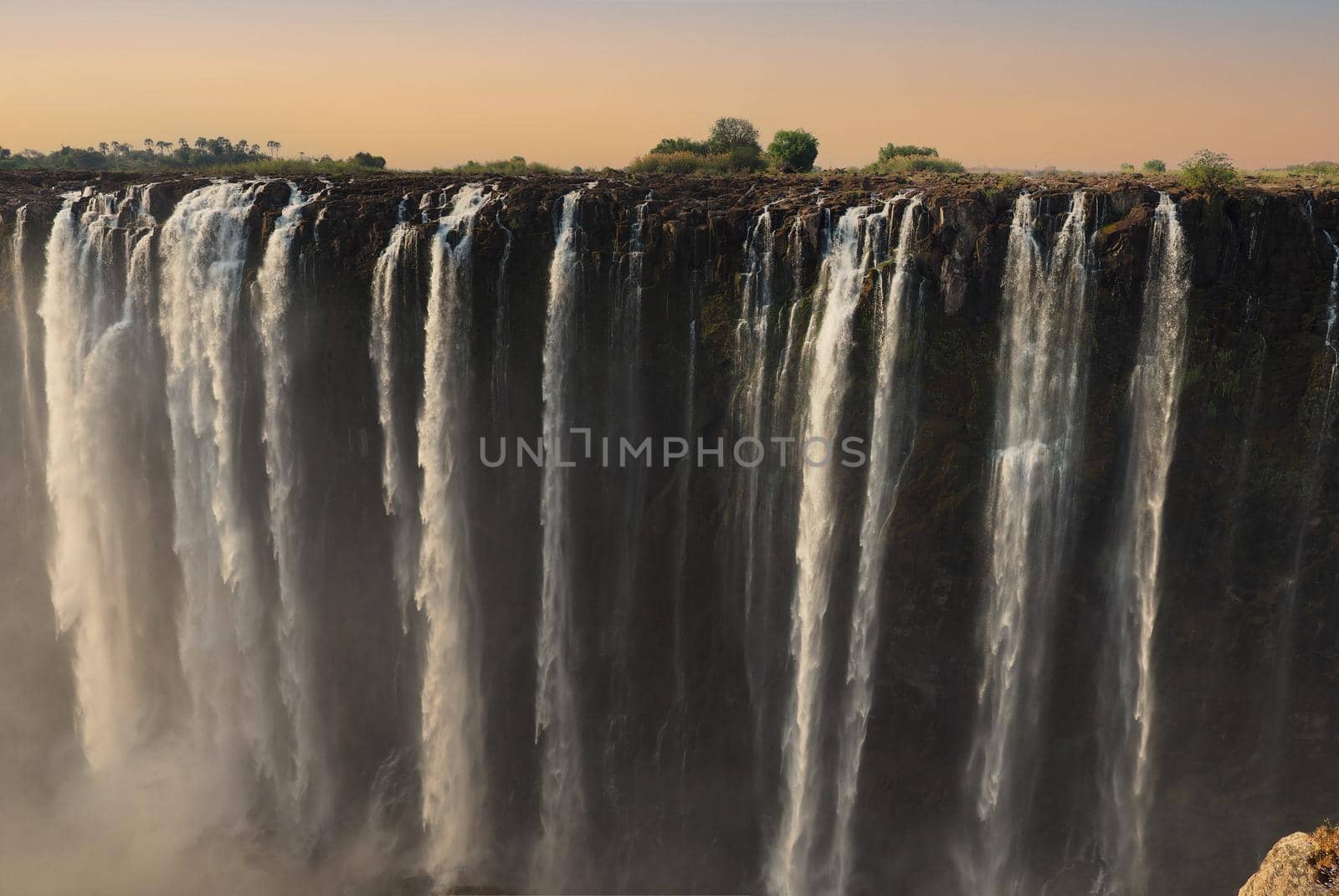 Victoria Falls on the Zambezi River between Zimbabwe and Zambia by fivepointsix