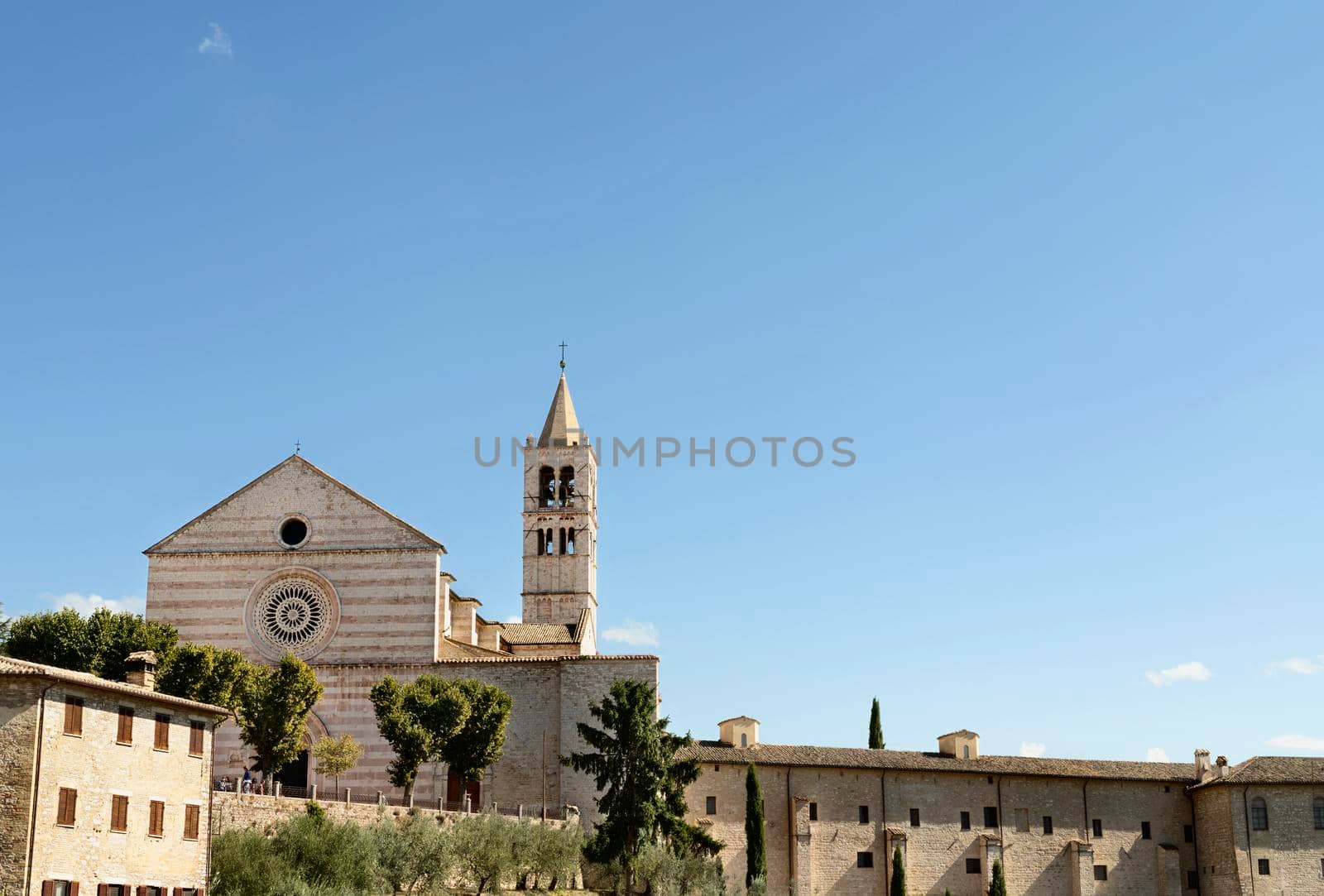 Basilica of Saint Clare , Basilica di Santa Chiara , in Assisi , beautiful romanesque facade