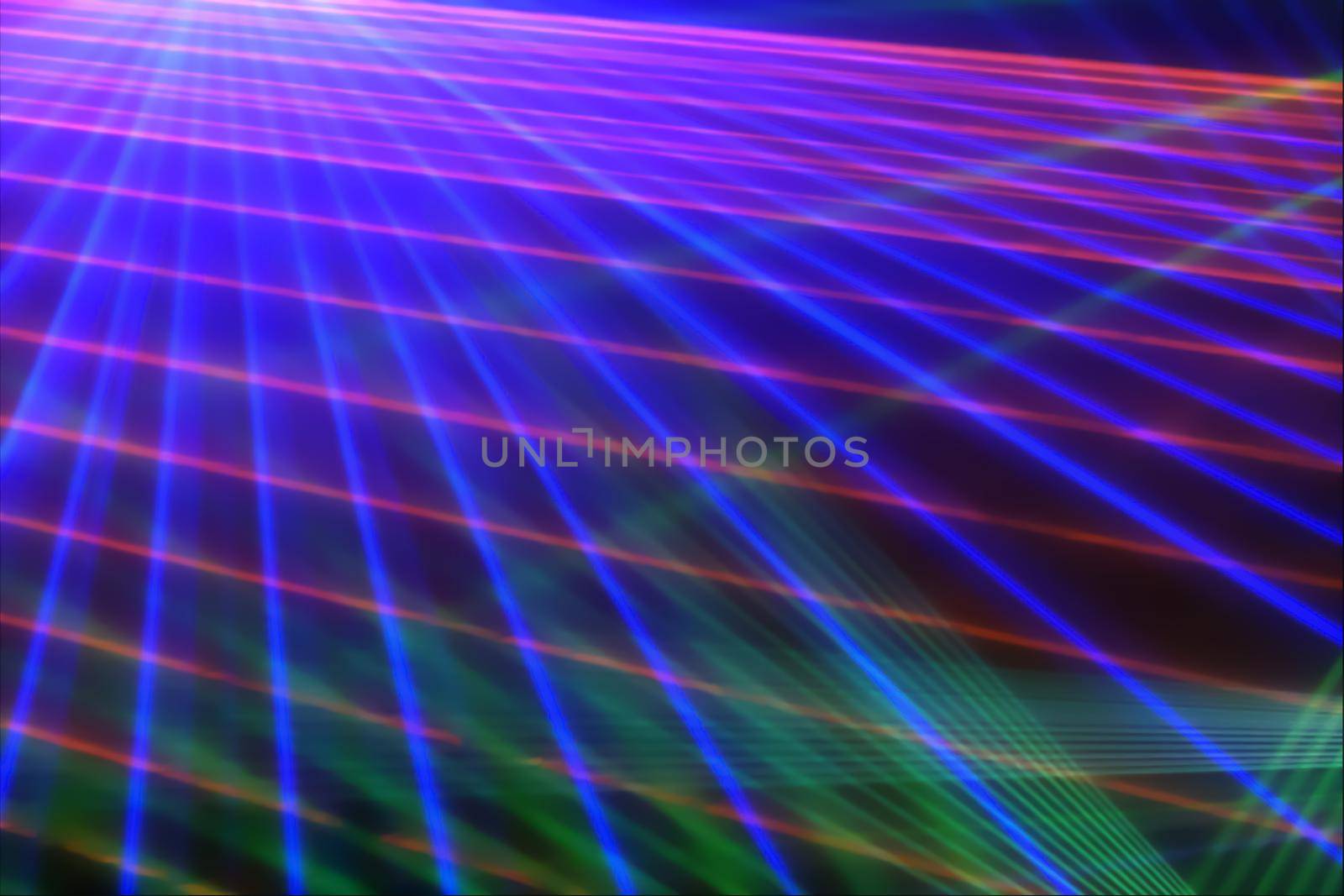 Colorful anniversary laser show with some smoke in the air. Party background.