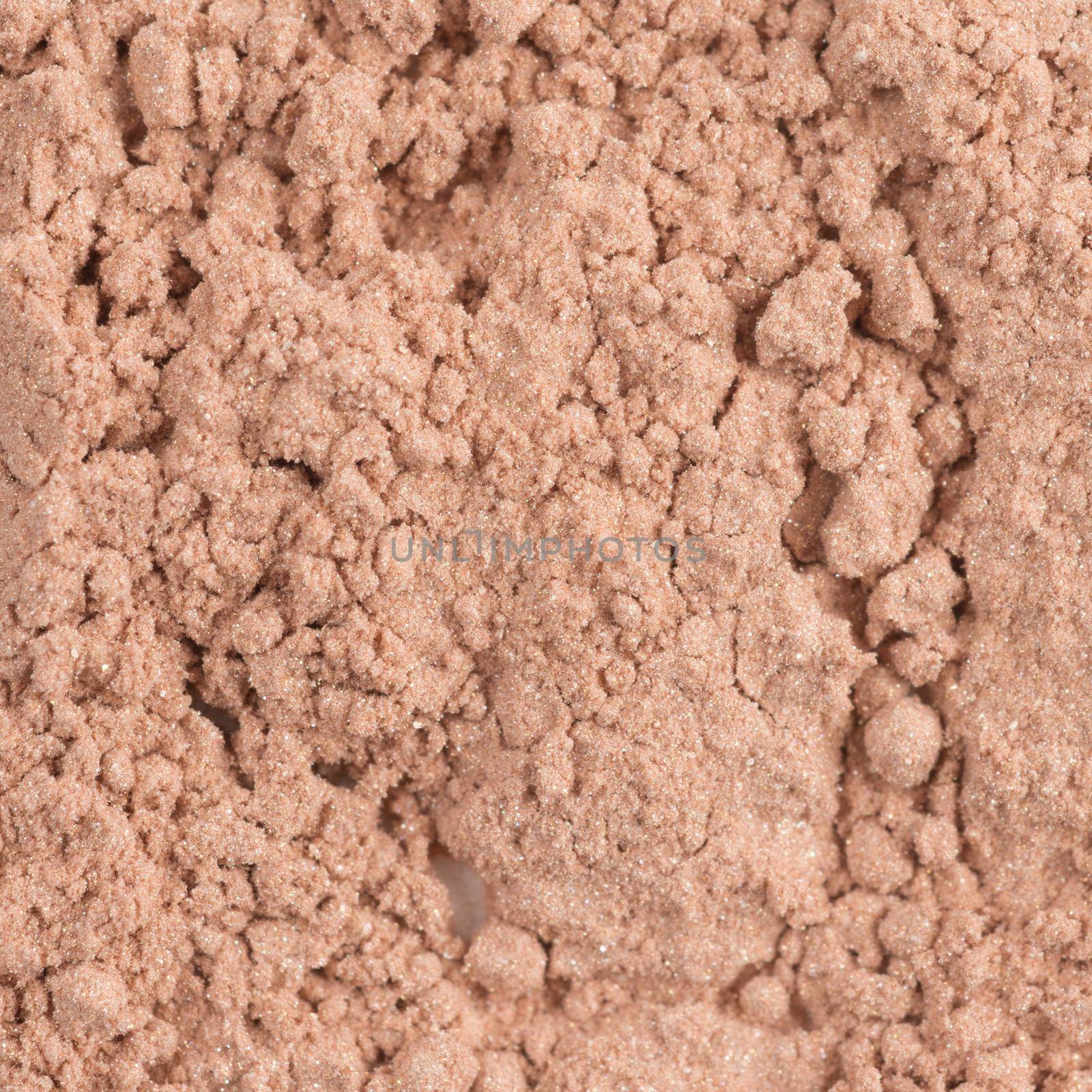 Cosmetic powder crushed square closeup macro shot