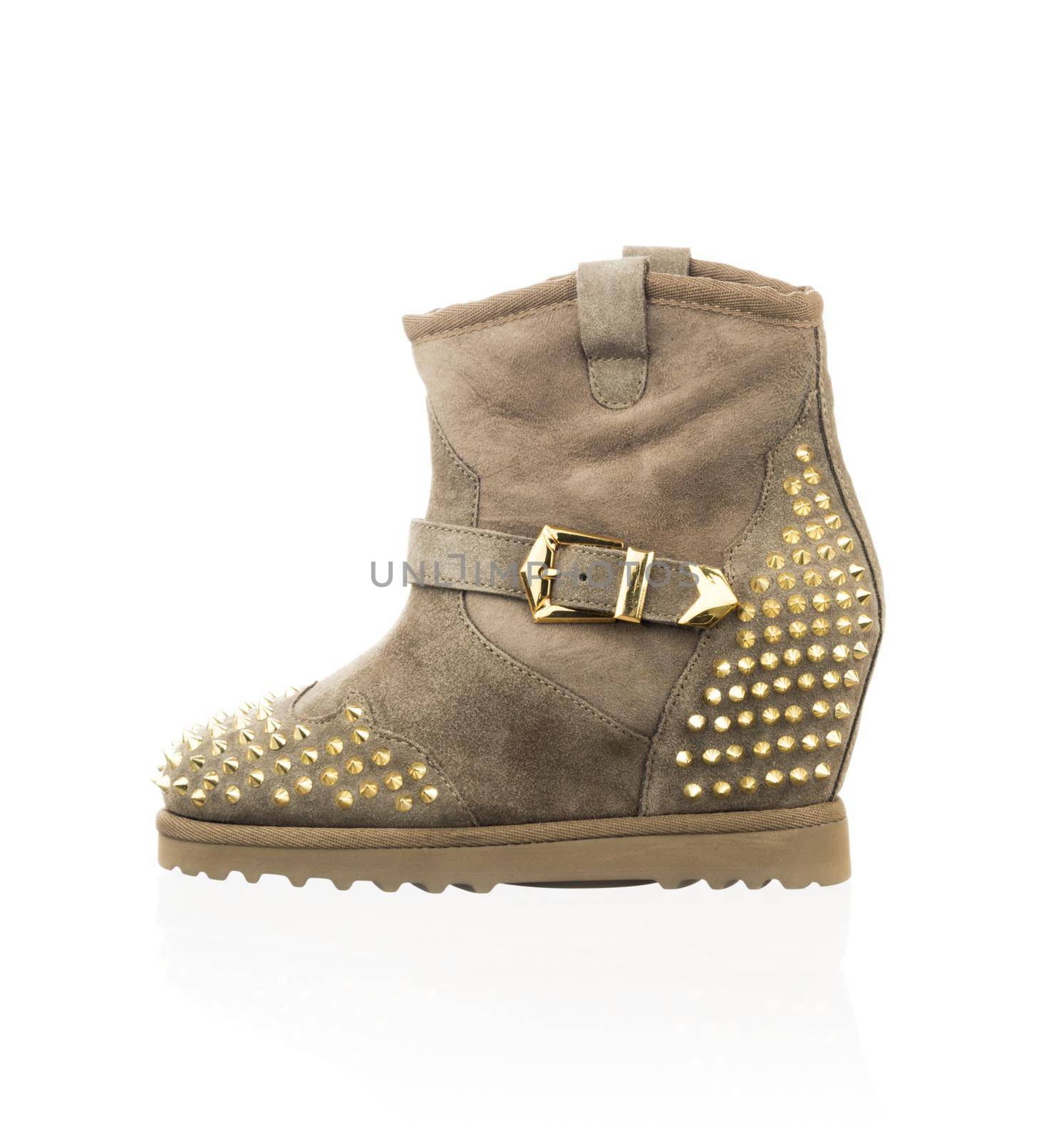 Modern fashionable women winter boot shot in studio