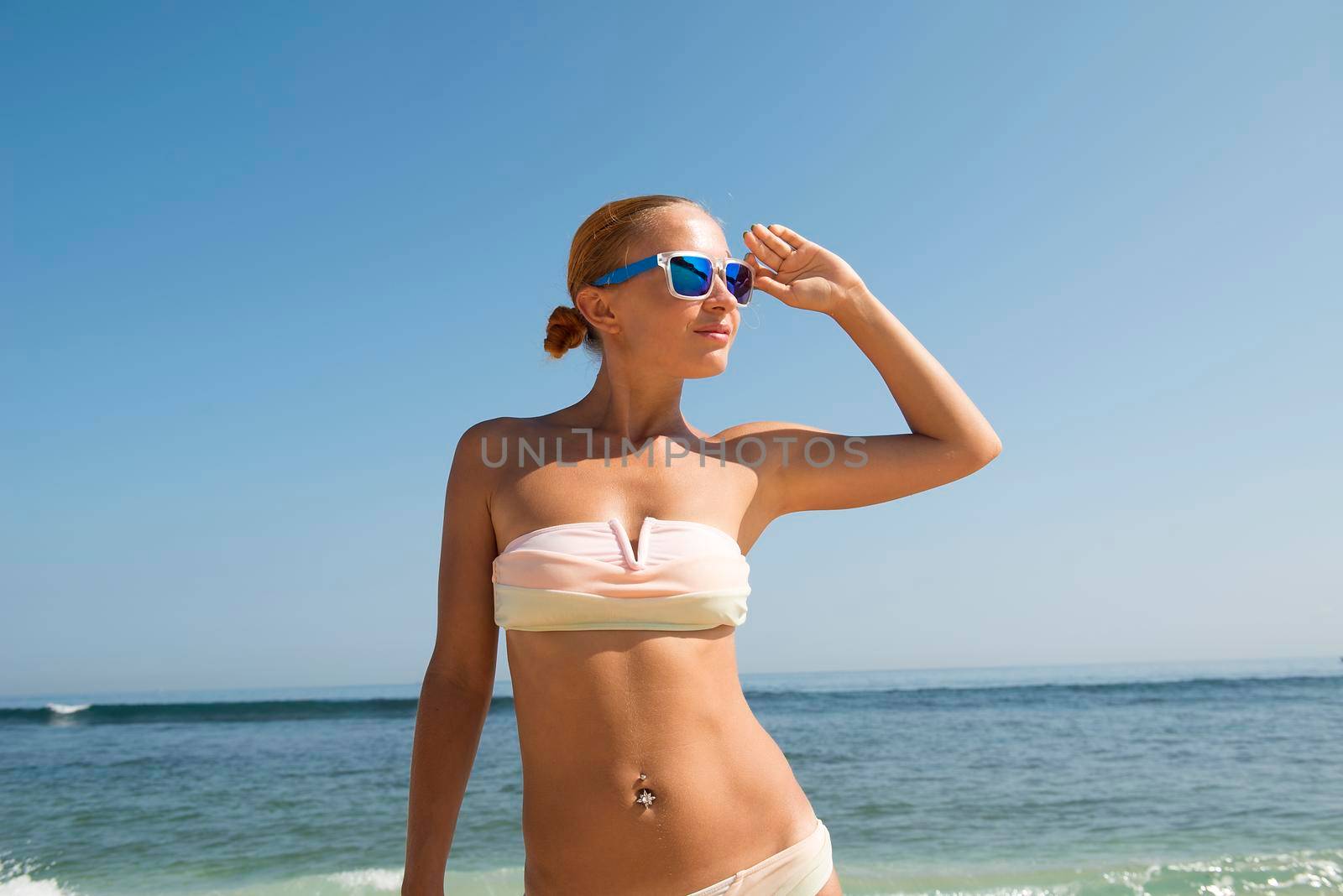 Young woman at the beach by nikitabuida