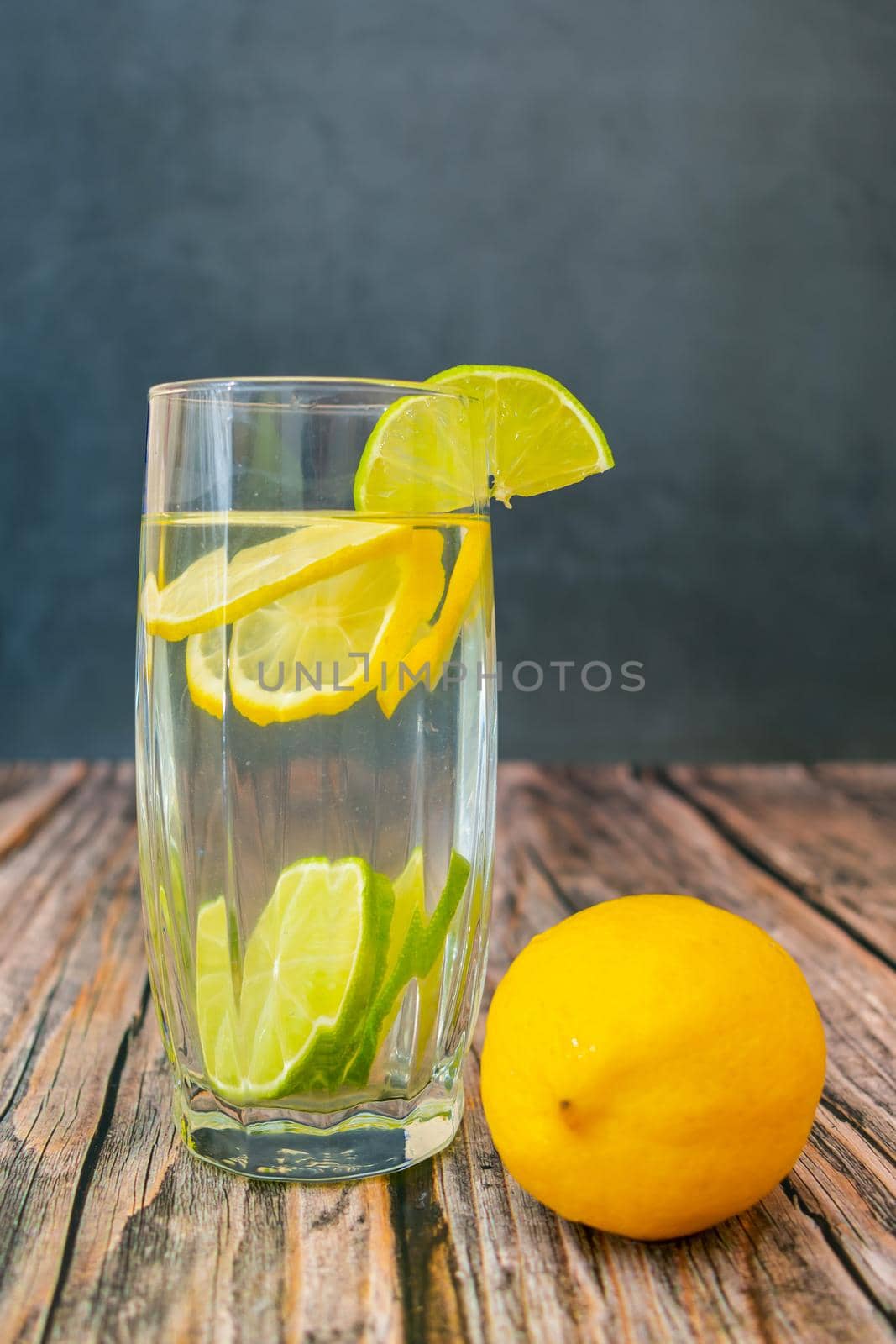 A healthy and invigorating summer drink made from lemon and lime juice with citrus fruit wedges