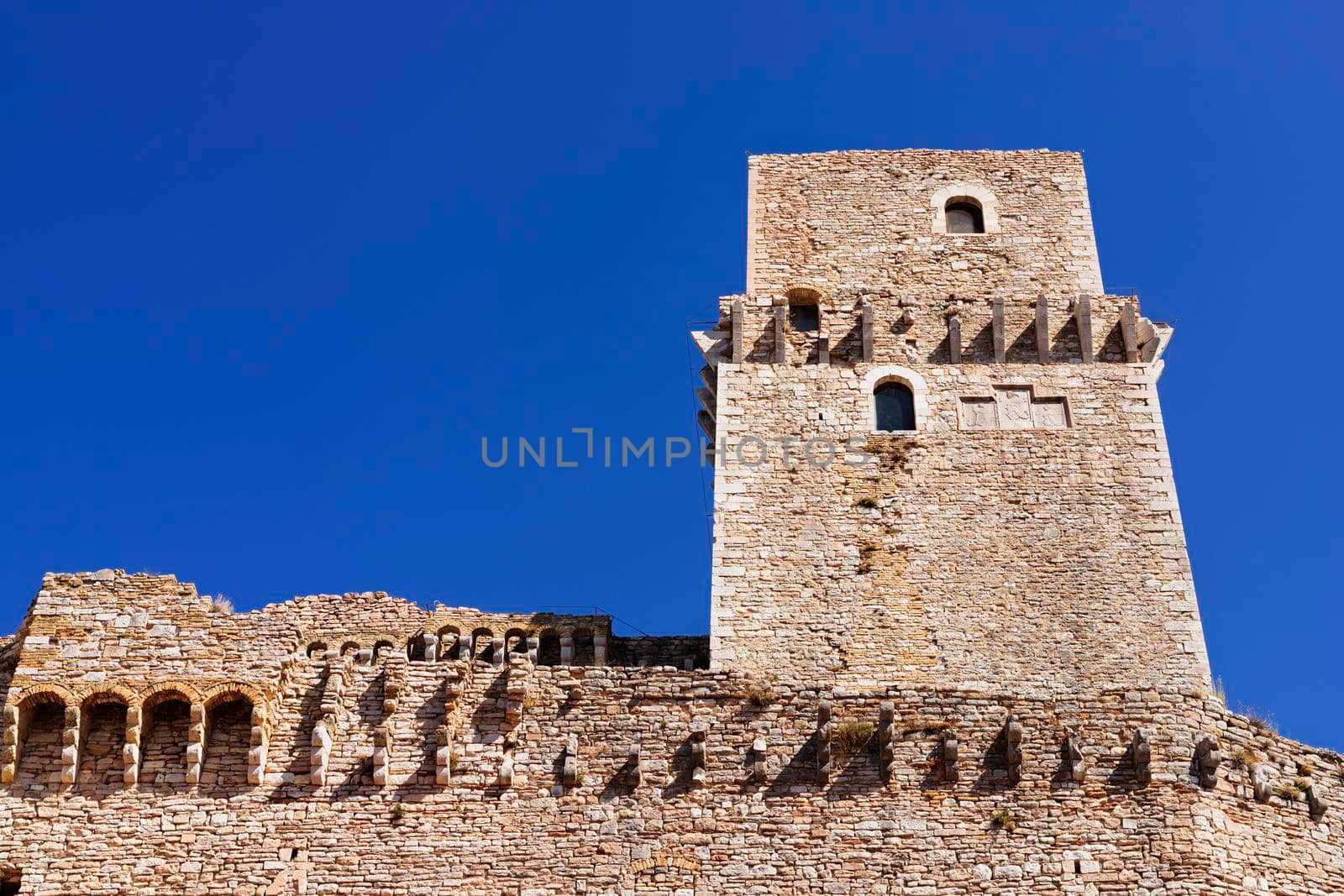 Assisi, Italy ,  tower of Rocca Maggiore fortress reconstructed in 1356, medieval military architecture