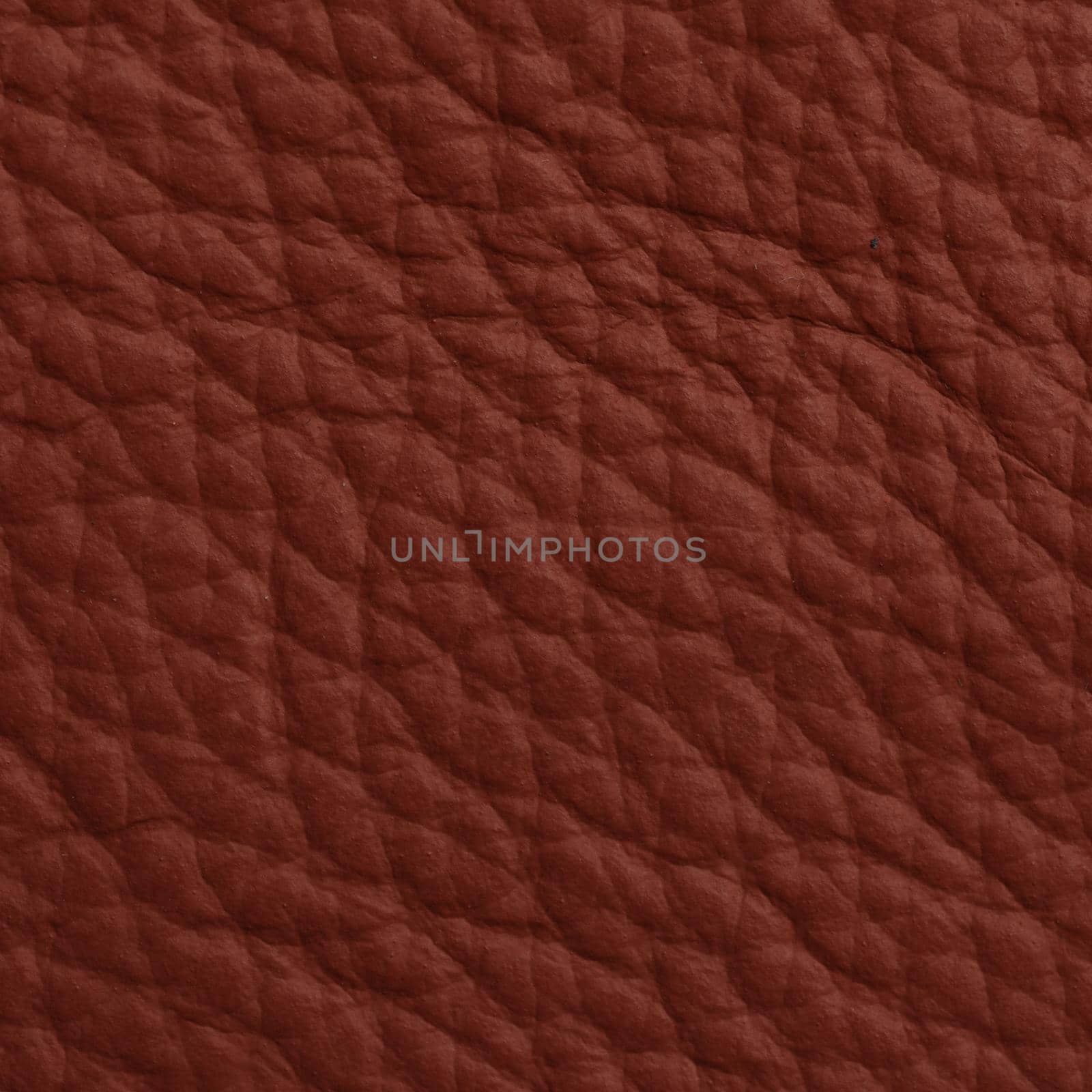 Red leather texture closeup macro shot for background