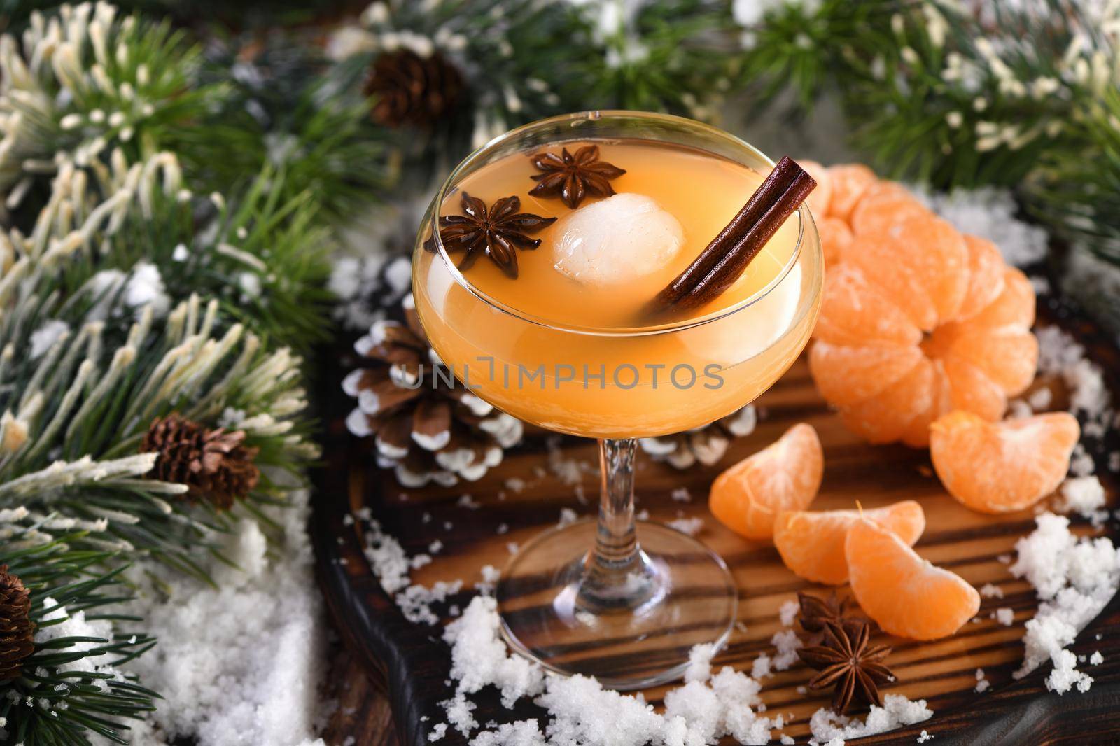 Negroni cocktail. Bourbon with cinnamon with mandarin juice and star anise. The perfect cozy cocktail for cold winter evenings.