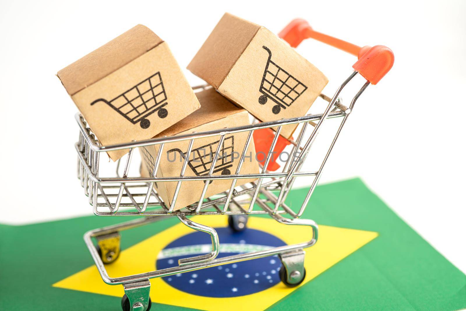 Box with shopping cart logo and Brazil flag, Import Export Shopping online or eCommerce finance delivery service store product shipping, trade, supplier concept. by pamai