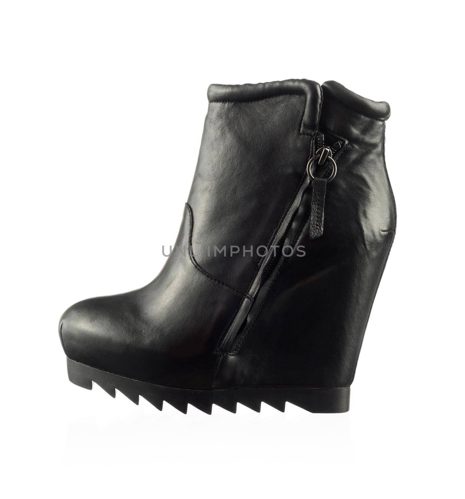 Modern fashionable women winter boot shot in studio