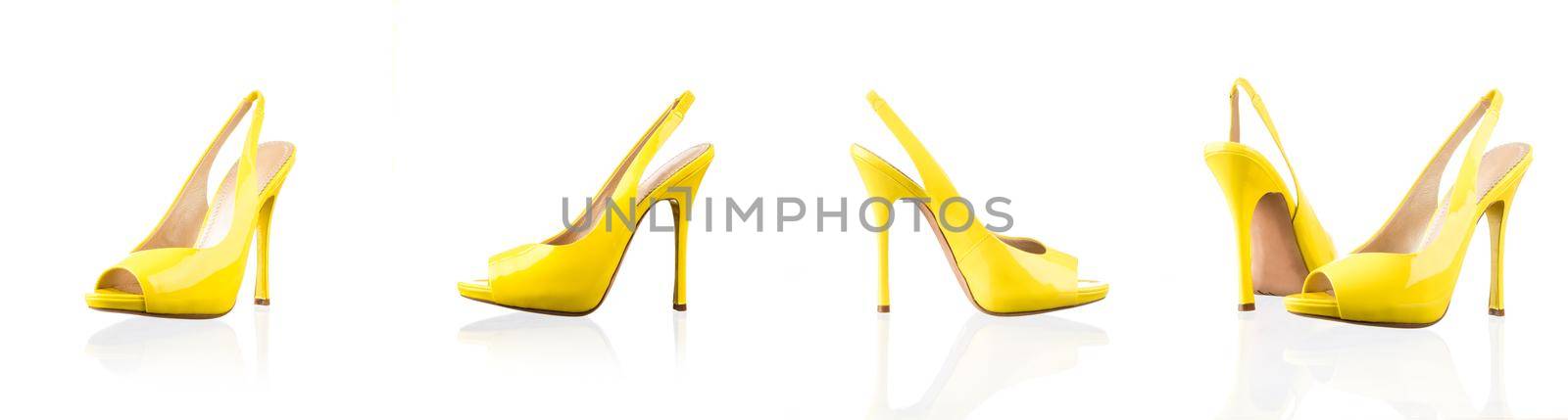 Yellow female shoes over white by nikitabuida
