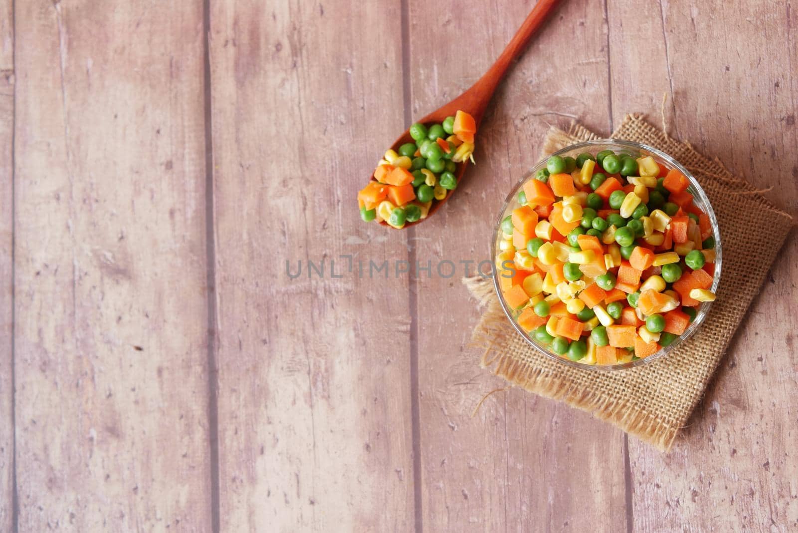 corn, carrot and beans in a bowl on table ,