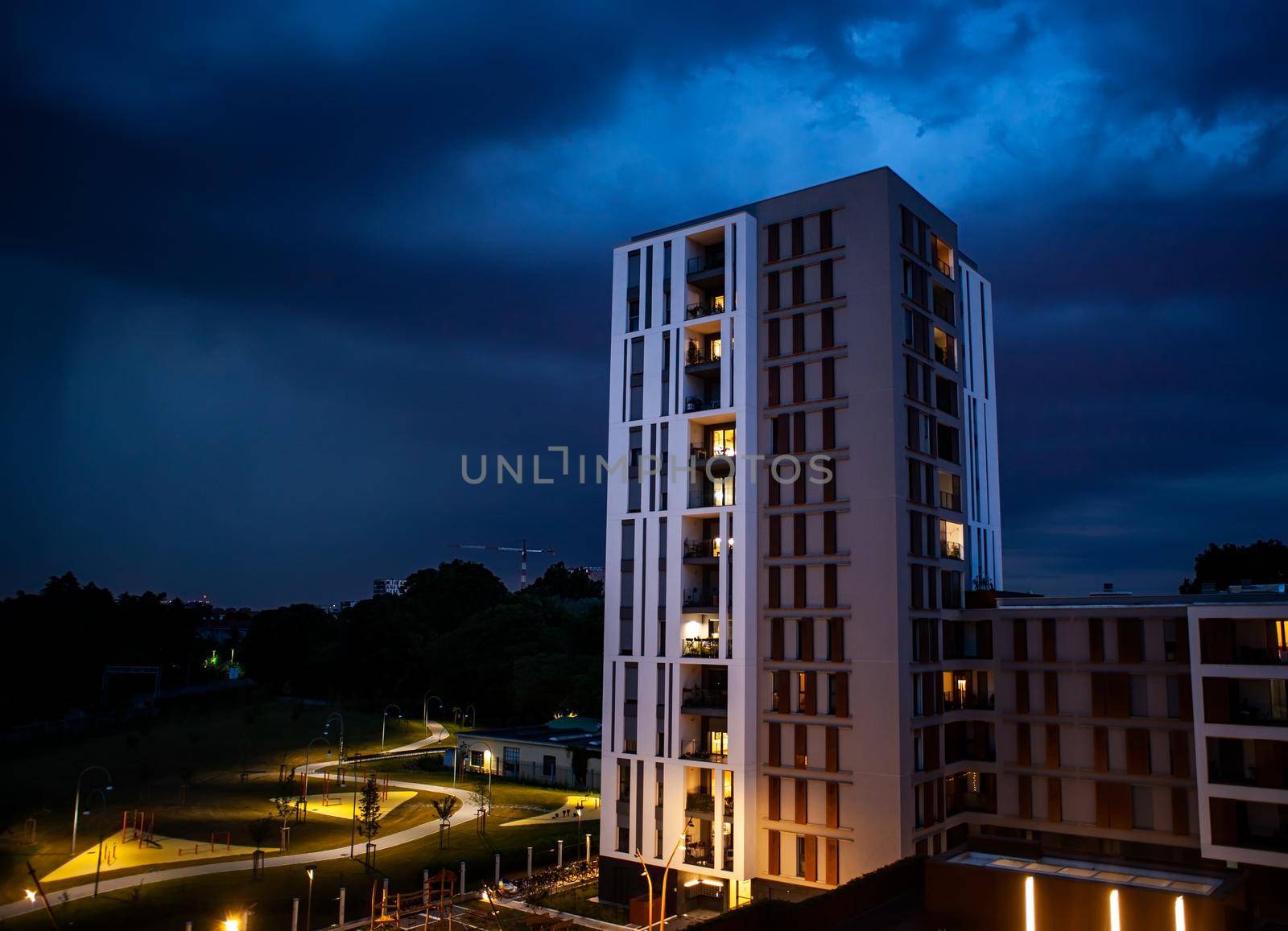 Night view of the residential complex called Moneta, Milan by bepsimage