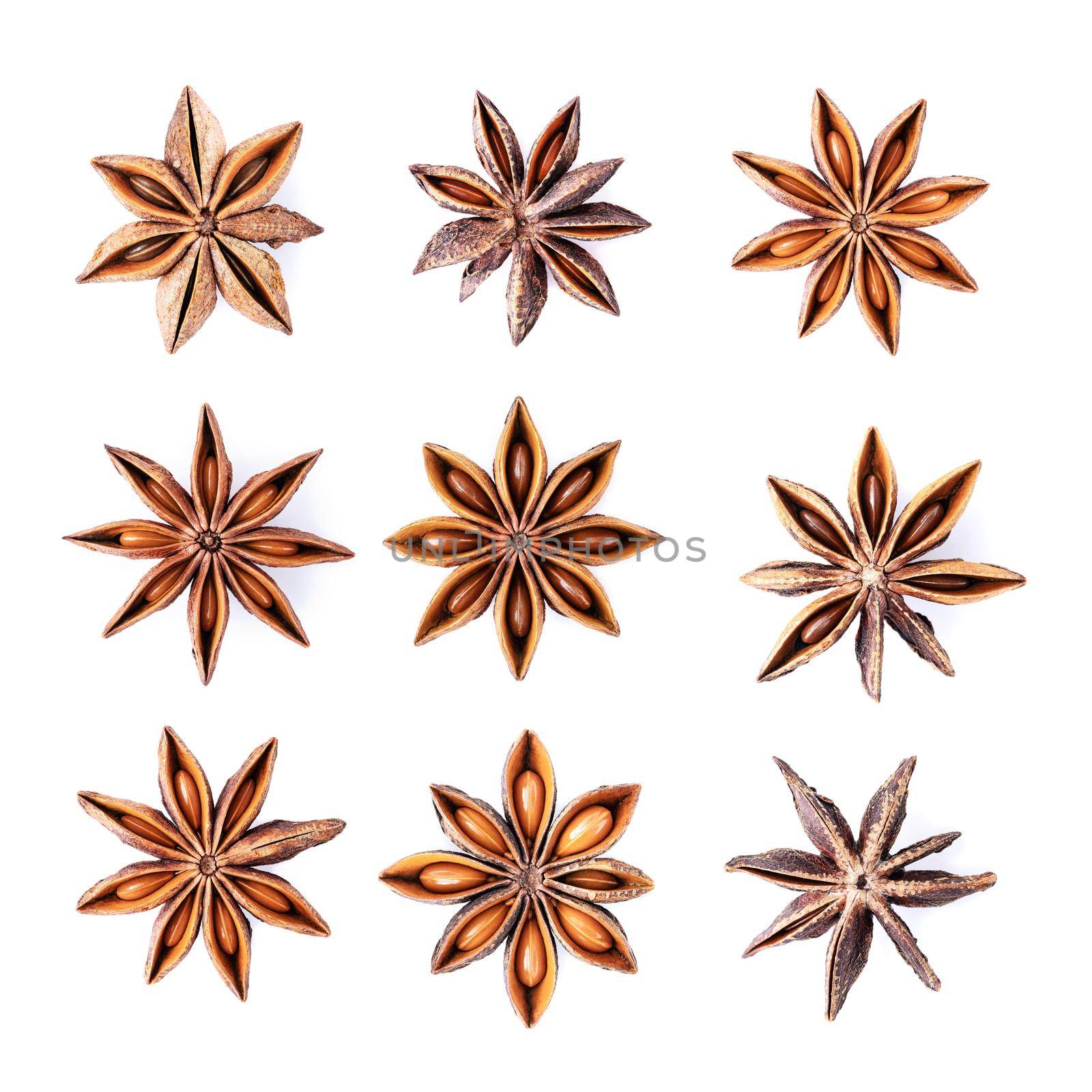 Various shapes of dried Chinese star anise isolated on white background. by kerdkanno