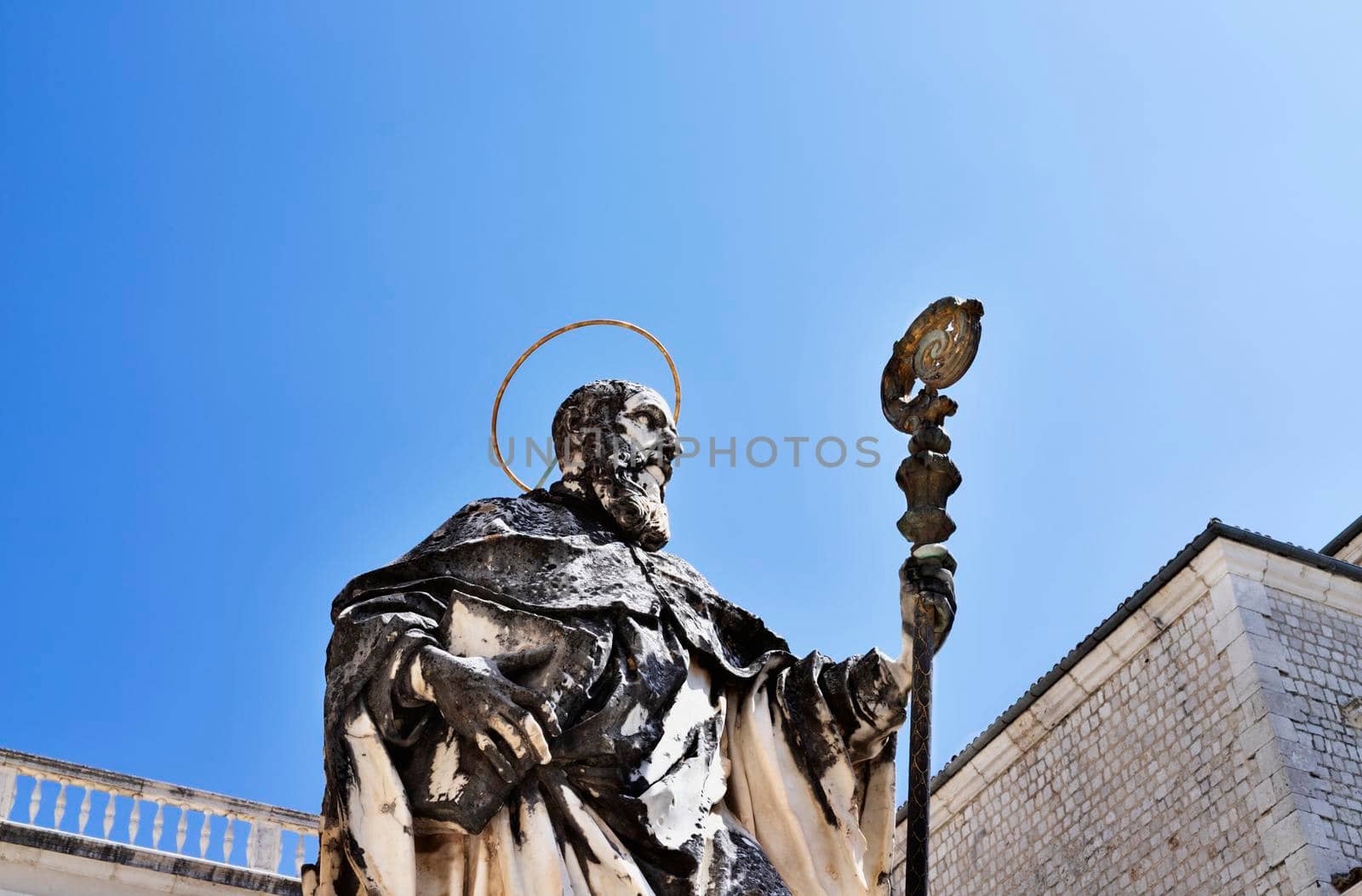 Montecassino Abbey -Italy - August 29-2021 -statue of St. Benedict against blue sky  , Benedictine monastery 