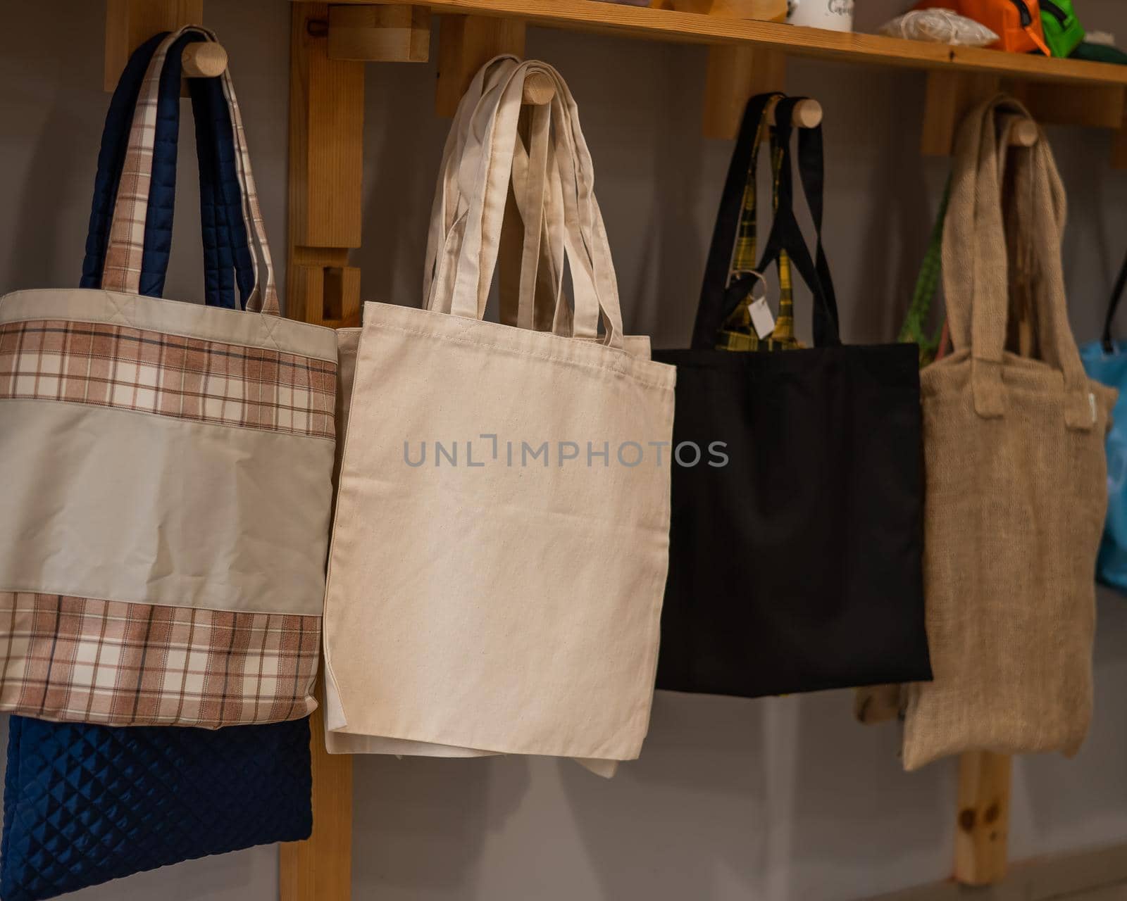 Choosing cotton bags in an eco-friendly store