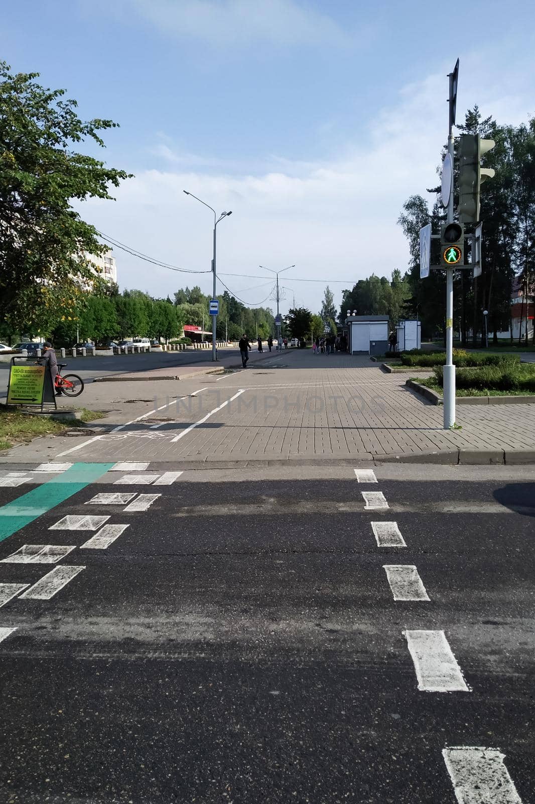 BELARUS, NOVOPOLOTSK - AUGUST 31, 2020: Pedestrian crossing and traffic light in summer