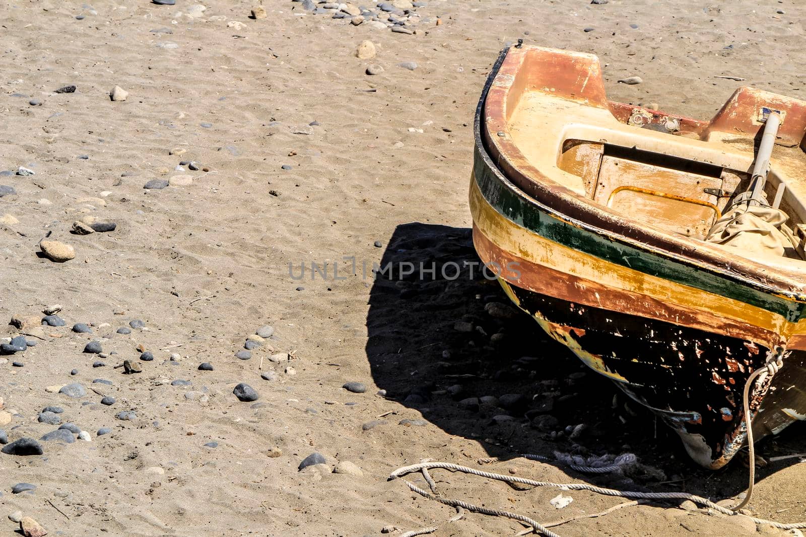 Old abandoned boat on the beach in Cabo de Gata, Almeria, Spain