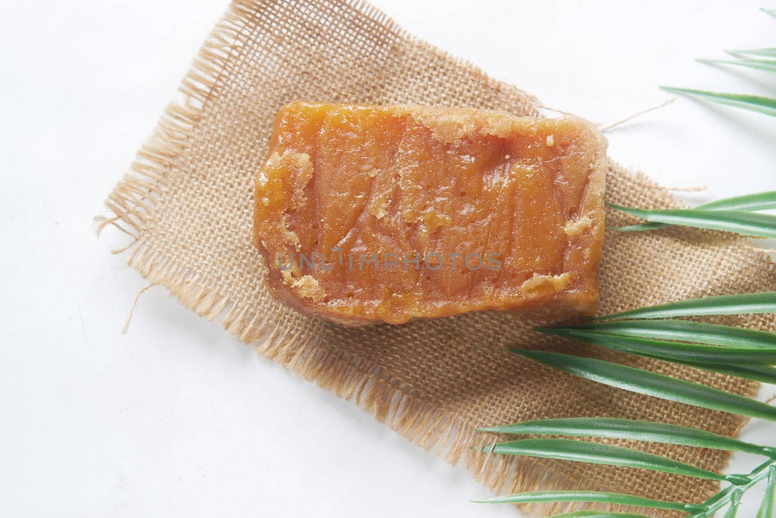 stack of Jaggery traditional cane sugar cube on table ,