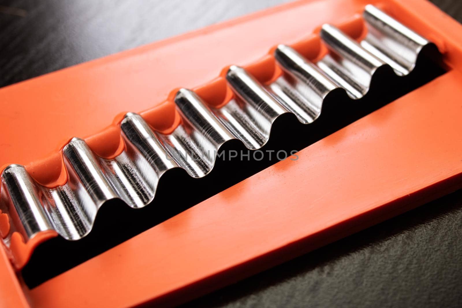 Grater for cutting vegetables on a wooden table
