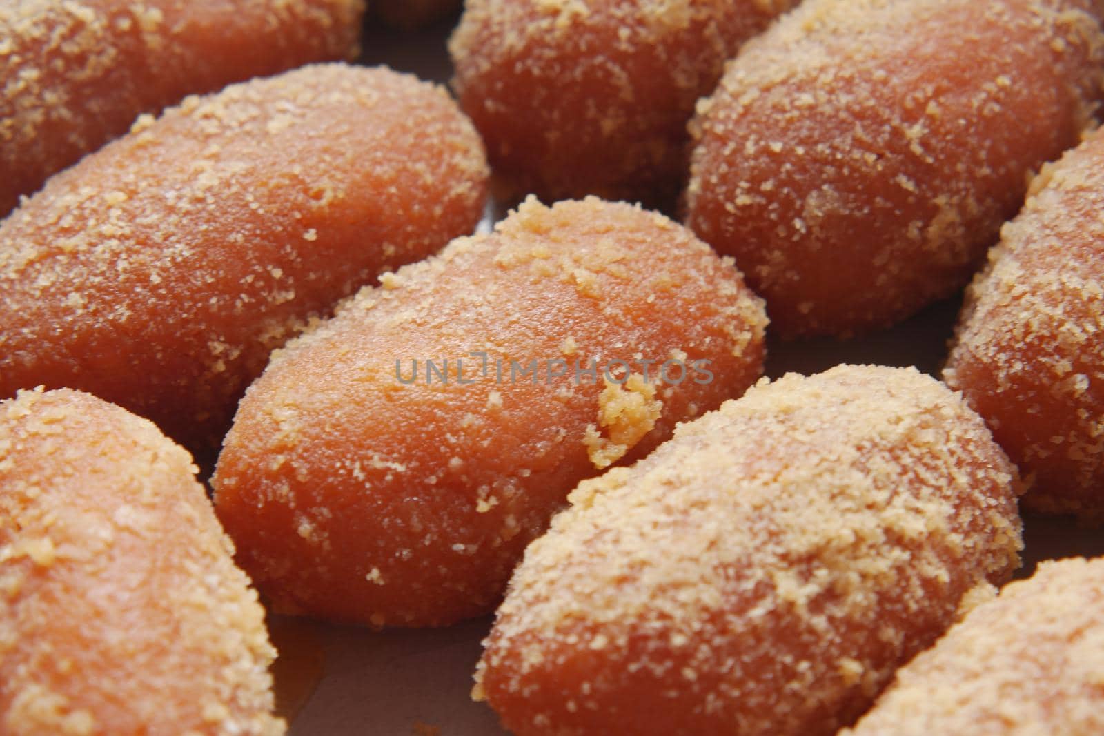 close up of indian sweet in a bowl on table