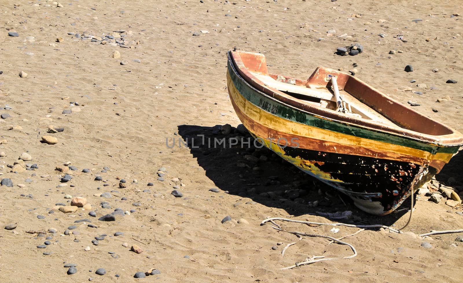 Old abandoned boat on the beach in Cabo de Gata, Almeria, Spain