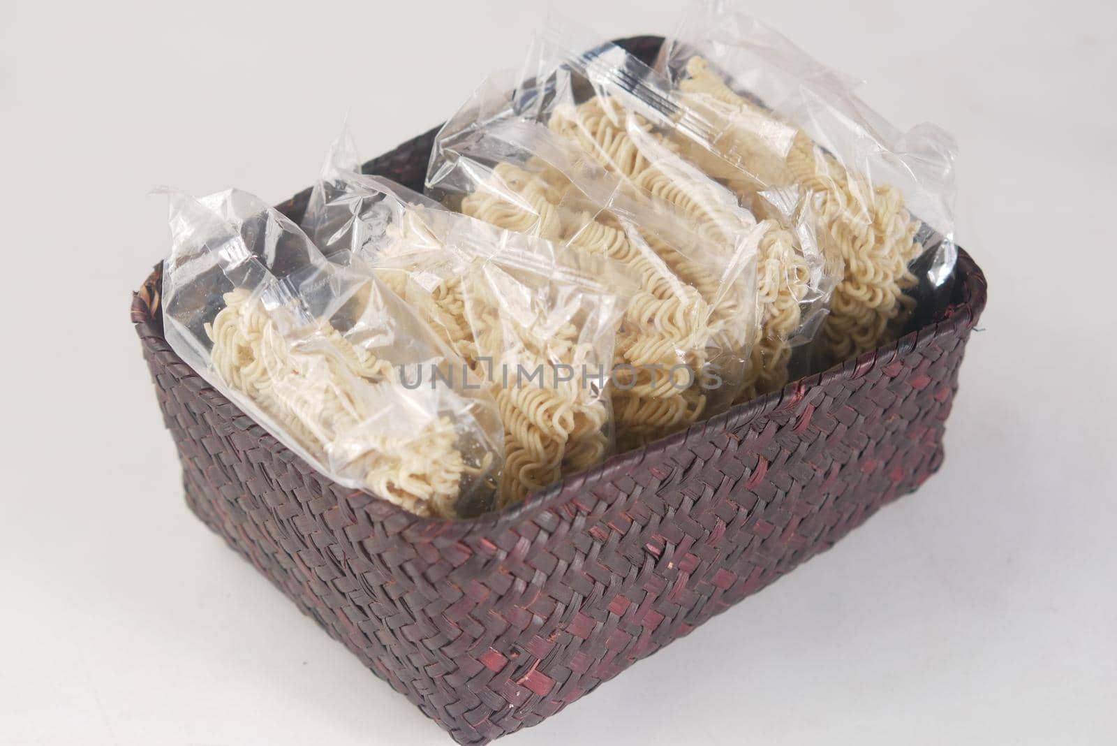 Noddle packet in a box on white background