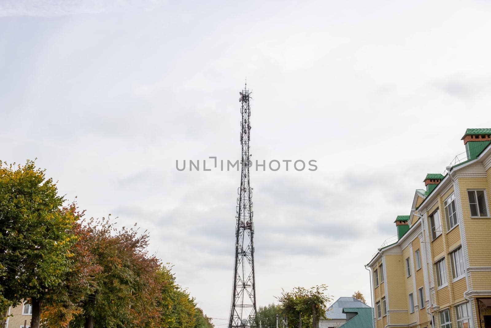 Telecommunications equipment of the 5G radio network with radio modules and intelligent antennas mounted on metal against a cloudy sky by lapushka62