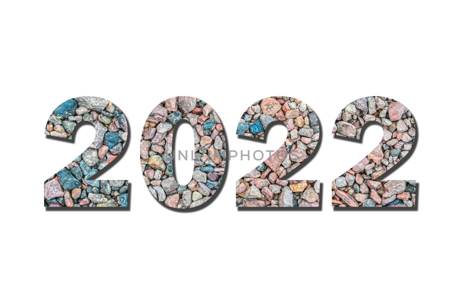 The number 2022 symbolizing the year, textured from small stones of different colors on a white background