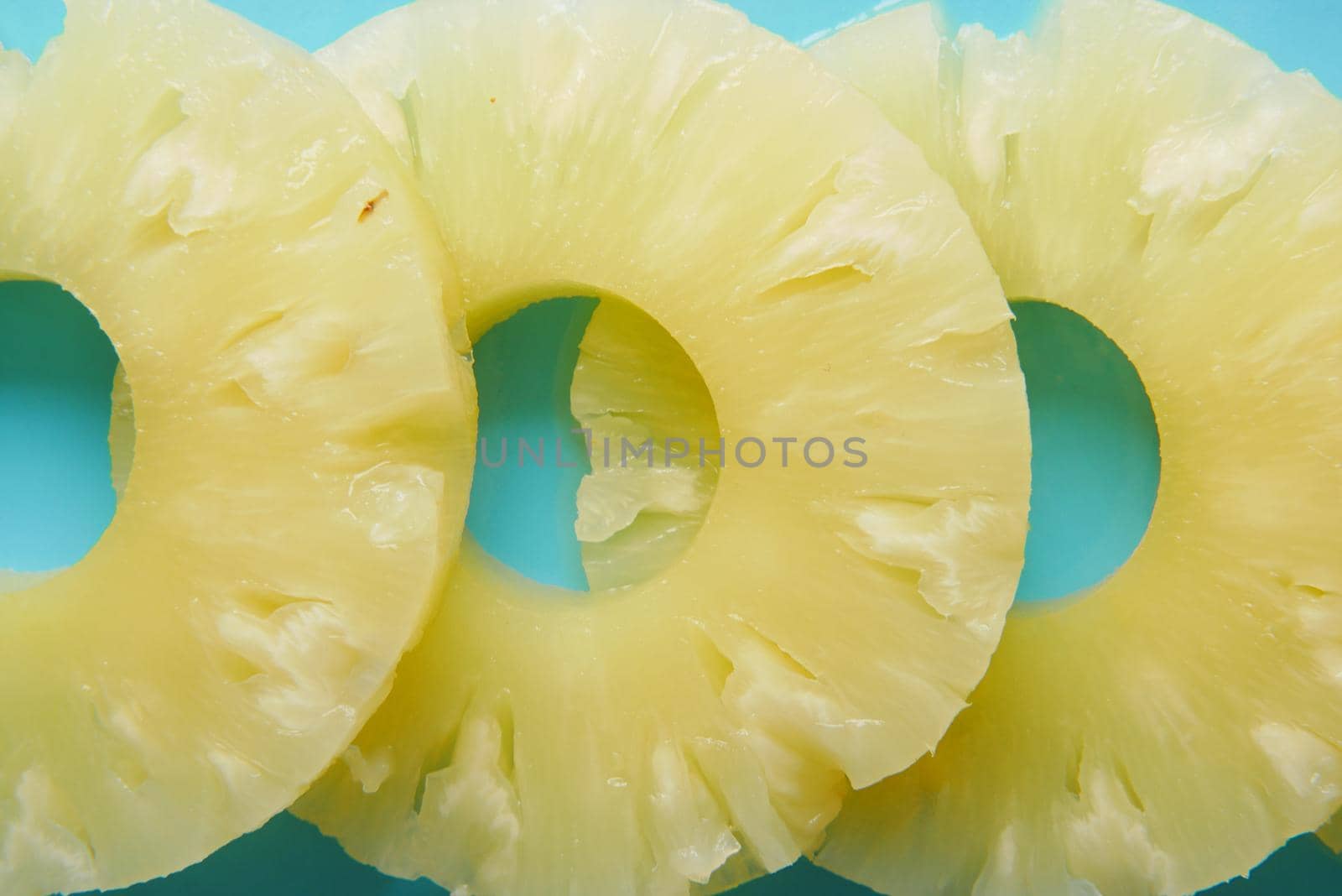 slice of pineapple in bowl on table .