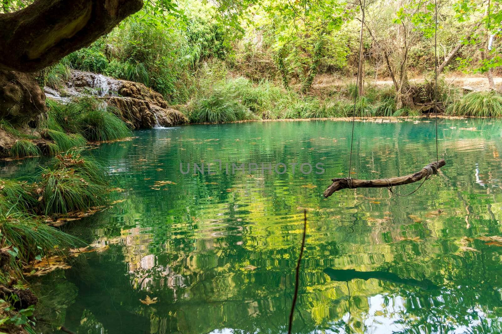 Mountain waterfall and lake at polilimnio, Messinia, Greece by ankarb