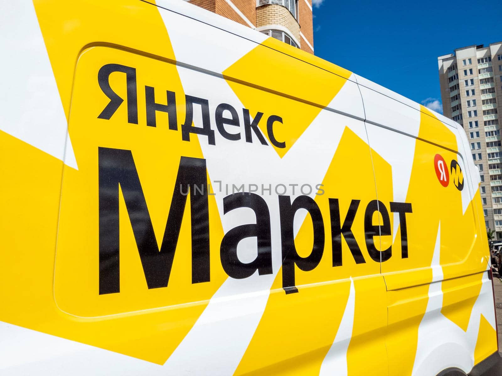 Moscow, Russia - May 25. 2021. Delivery vehicle for goods from the Yandex market online store by olgavolodina