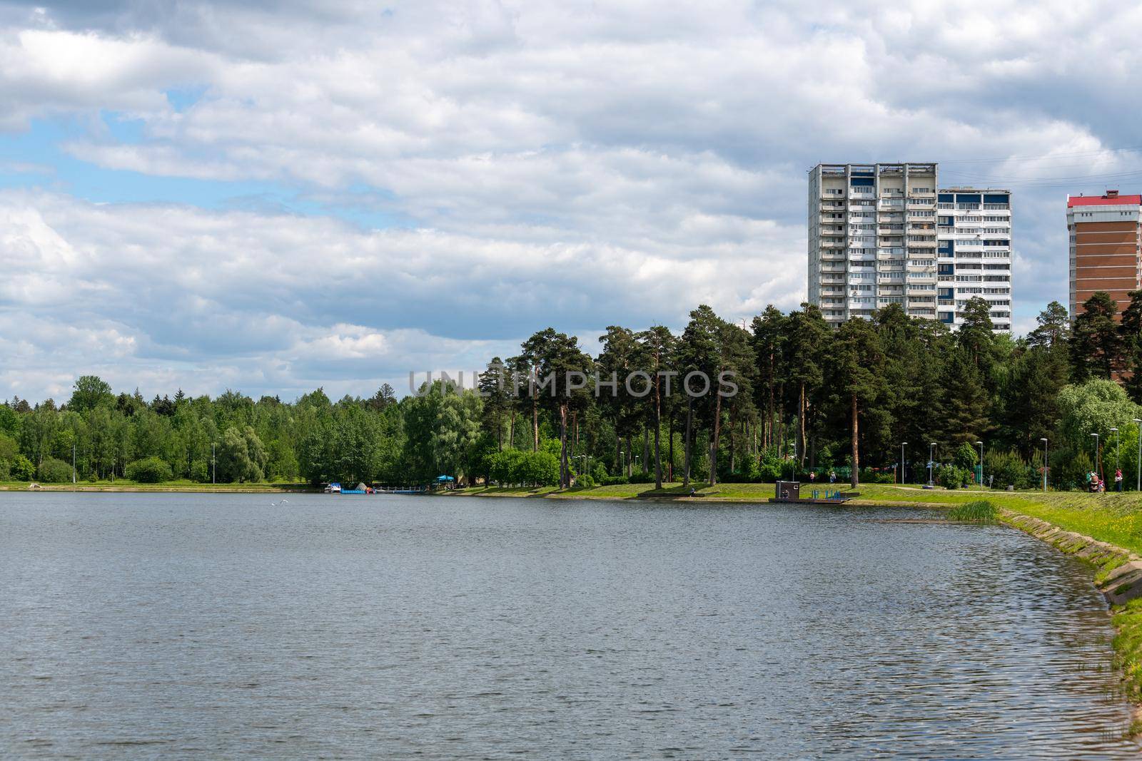 Moscow, Russia - June 2. 2021. The School lake in Zelenograd by olgavolodina