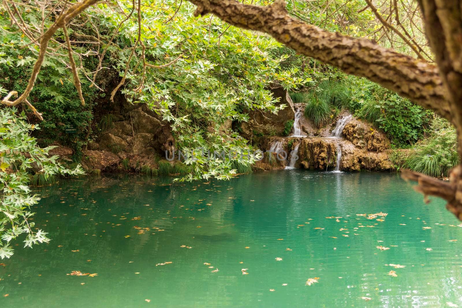 Mountain waterfall and lake view at polilimnio, Messinia, Greece