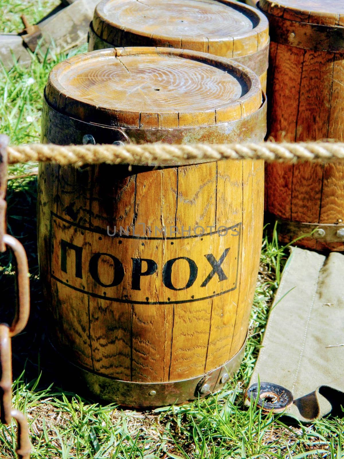 old large barrels on the road of gunpowder. High quality photo