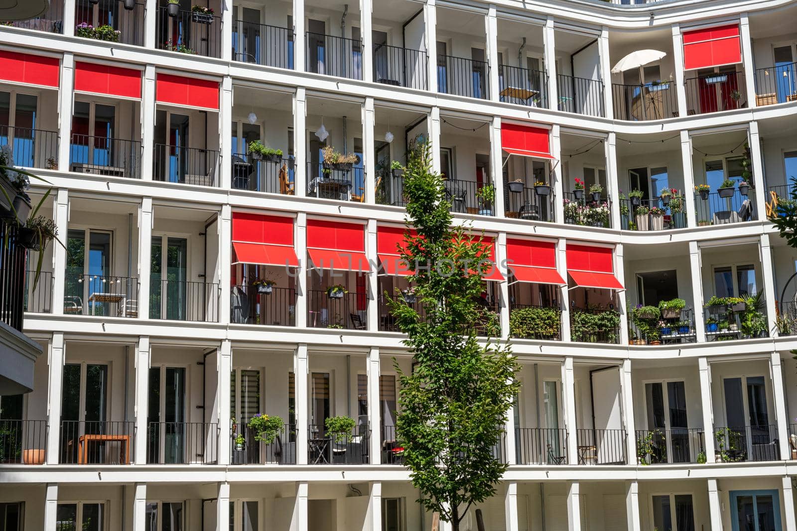 Facade of a modern apartment complex by elxeneize
